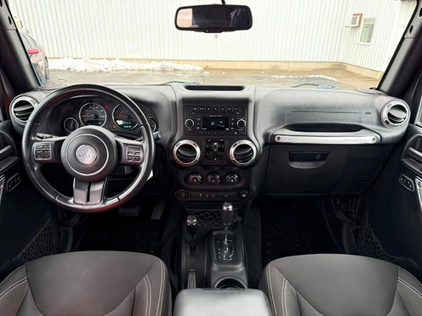 2017 GRAY /Black Jeep Wrangler Unlimited Sahara 4x4 (1C4BJWEG0HL) with an Pentastar 3.6L V-6 DOHC engine, AUTOMATIC transmission - At Timberline Auto, finding a great deal on your next vehicle is always easy! Our experienced sales staff's goal is to help find you the right vehicle at the right price! Our knowledgeable finance department has options for almost any credit score. We offer extended service contract options to prote - Photo#19