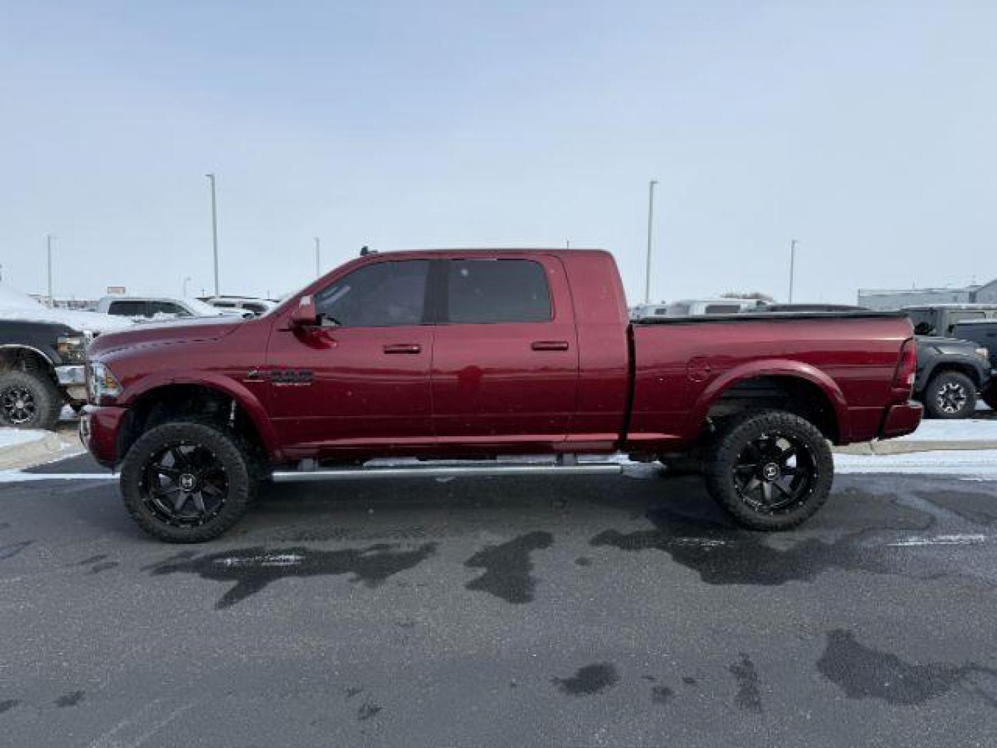 2017 MAROON /Black, leather Ram 2500 (3C6UR5NL4HG) with an 67L L6 OHV 24V TURBO DIESEL engine, Automatic transmission, located at 1175 N Woodruff Ave, Idaho Falls, ID, 83401, 43.506901, -111.999657 - Photo#1