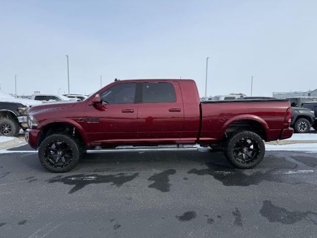 2017 Delmonico Red Pearlcoat /Black Ram 2500 Laramie (3C6UR5NL4HG) with an 6 Cyl, 6.7L engine, 6-Speed Automatic transmission, located at 1175 N Woodruff Ave, Idaho Falls, ID, 83401, 43.506901, -111.999657 - <b>Vehicle Details</b><br>Take command of serious capability and premium comfort with this pre-owned 2017 Ram 2500 Laramie 4WD, now available in Idaho Falls, ID. Powered by a proven 6 Cyl, 6.7L Diesel engine, this heavy-duty truck is built for drivers who need strength, confidence, and refinement in- Photo#1