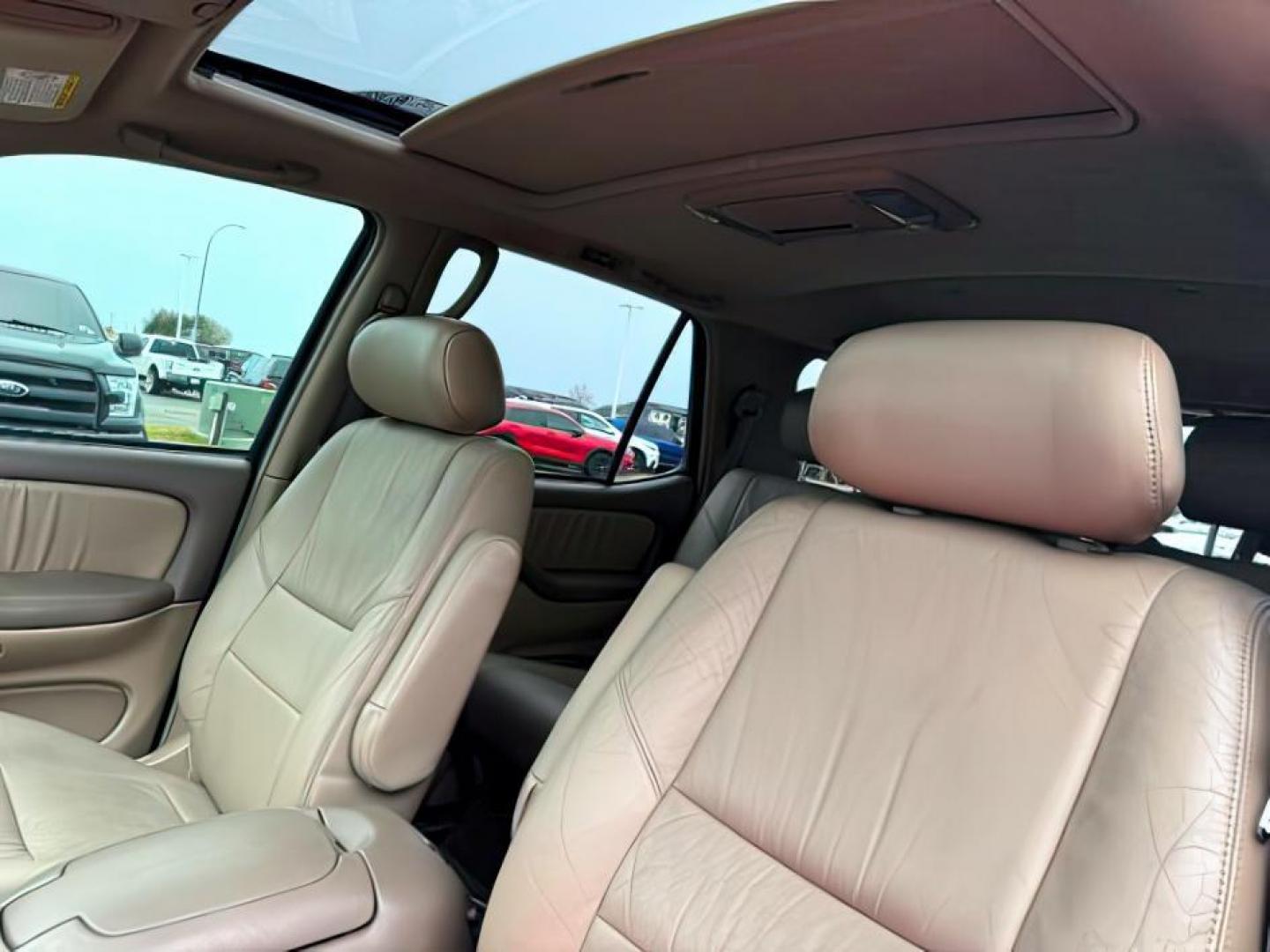 2004 GRAY /Charcoal Toyota Sequoia (5TDBT48A74S) with an 47L V-8 DOHC engine, Automatic transmission, located at 1175 N Woodruff Ave, Idaho Falls, ID, 83401, 43.506901, -111.999657 - At Timberline Auto, finding a great deal on your next vehicle is always easy! Our experienced sales staff's goal is to help find you the right vehicle at the right price! Our knowledgeable finance department has options for almost any credit score. We offer extended service contract options to prote - Photo#20