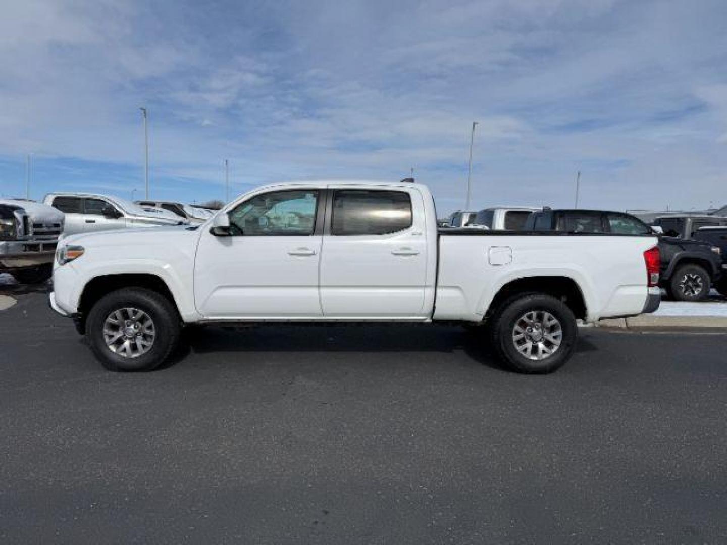 2016 Super White /Black/Red Toyota Tacoma (3TMDZ5BN8GM) with an 35L V-6 portdirect injection engine, Automatic transmission, located at 1175 N Woodruff Ave, Idaho Falls, ID, 83401, 43.506901, -111.999657 - Photo#1