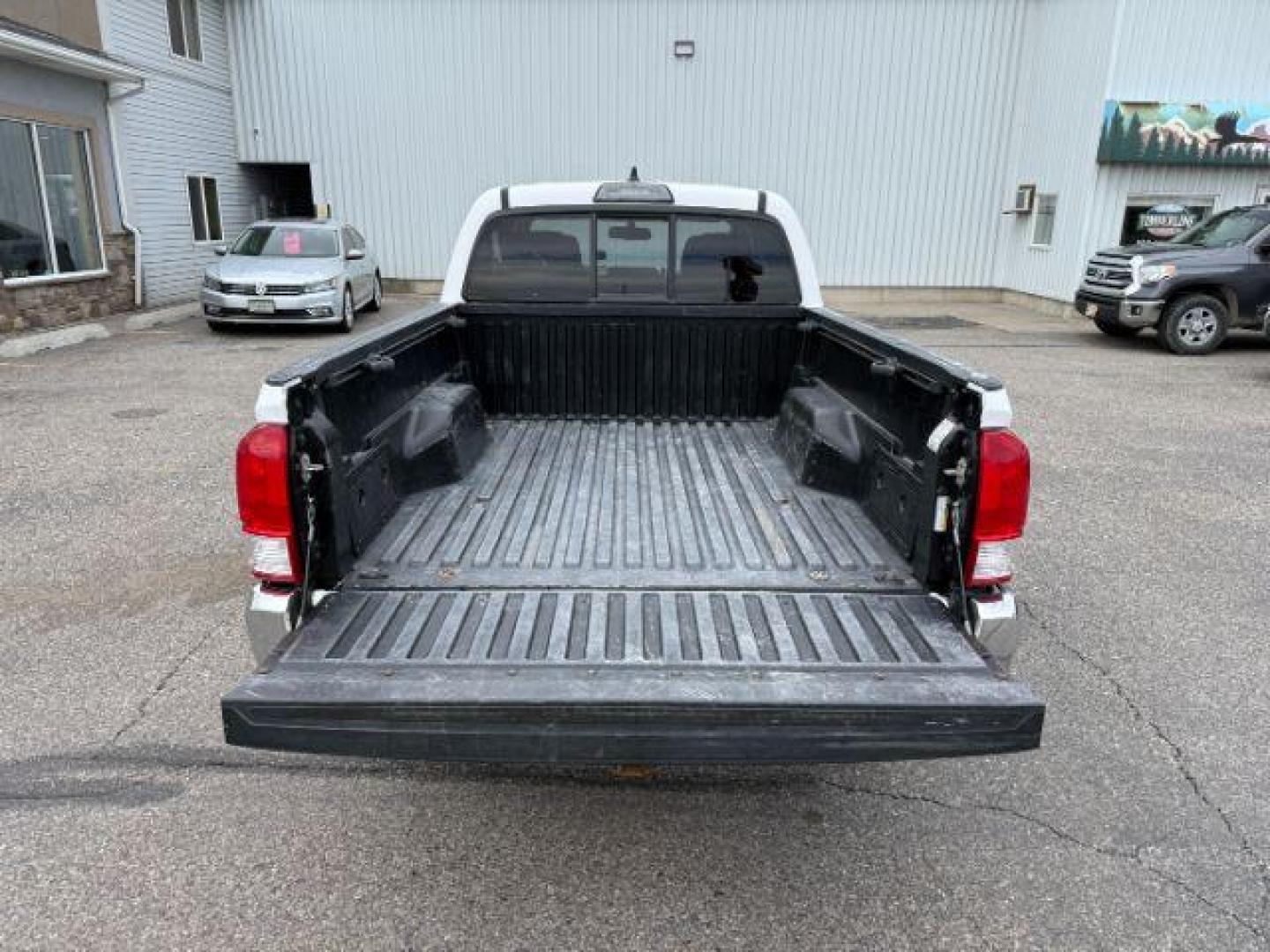 2016 Super White /Black/Red Toyota Tacoma (3TMDZ5BN8GM) with an 35L V-6 portdirect injection engine, Automatic transmission, located at 1175 N Woodruff Ave, Idaho Falls, ID, 83401, 43.506901, -111.999657 - At Timberline Auto, finding a great deal on your next vehicle is always easy! Our experienced sales staff's goal is to help find you the right vehicle at the right price! Our knowledgeable finance department has options for almost any credit score. We offer extended service contract options to prote - Photo#26