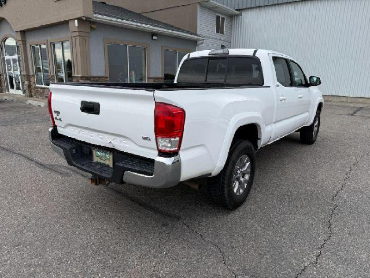 2016 Super White /Black/Red Toyota Tacoma (3TMDZ5BN8GM) with an 35L V-6 portdirect injection engine, Automatic transmission, located at 1175 N Woodruff Ave, Idaho Falls, ID, 83401, 43.506901, -111.999657 - At Timberline Auto, finding a great deal on your next vehicle is always easy! Our experienced sales staff's goal is to help find you the right vehicle at the right price! Our knowledgeable finance department has options for almost any credit score. We offer extended service contract options to prote - Photo#27