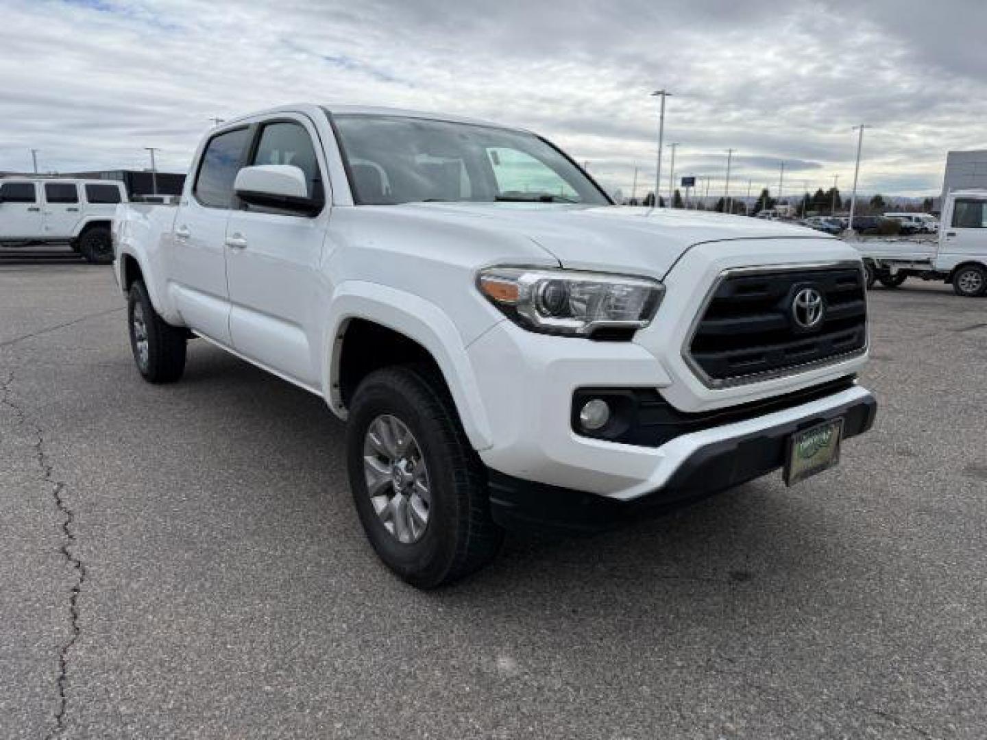 2016 Super White /Black/Red Toyota Tacoma (3TMDZ5BN8GM) with an 35L V-6 portdirect injection engine, Automatic transmission, located at 1175 N Woodruff Ave, Idaho Falls, ID, 83401, 43.506901, -111.999657 - At Timberline Auto, finding a great deal on your next vehicle is always easy! Our experienced sales staff's goal is to help find you the right vehicle at the right price! Our knowledgeable finance department has options for almost any credit score. We offer extended service contract options to prote - Photo#29