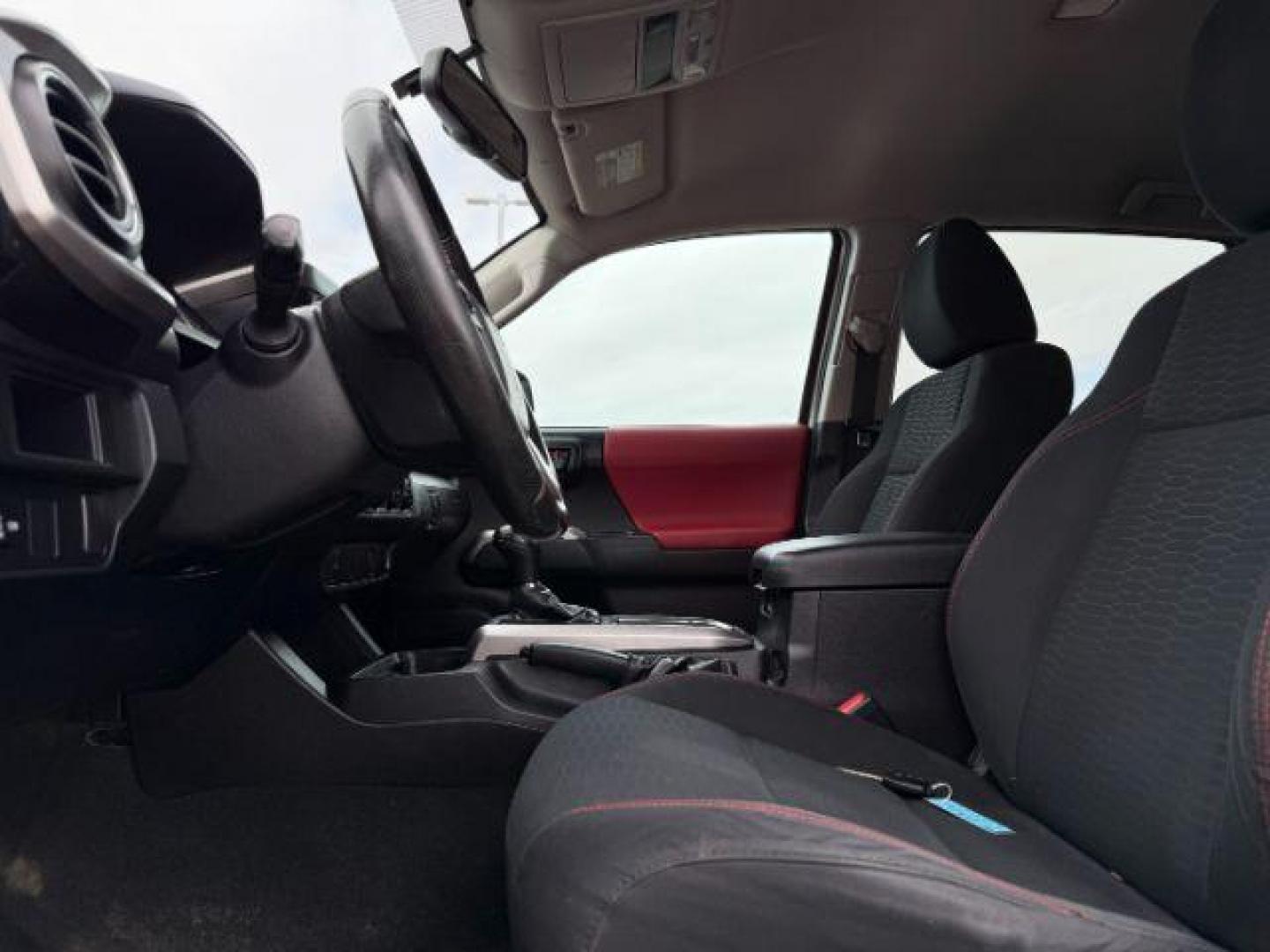 2016 Super White /Black/Red Toyota Tacoma (3TMDZ5BN8GM) with an 35L V-6 portdirect injection engine, Automatic transmission, located at 1175 N Woodruff Ave, Idaho Falls, ID, 83401, 43.506901, -111.999657 - At Timberline Auto, finding a great deal on your next vehicle is always easy! Our experienced sales staff's goal is to help find you the right vehicle at the right price! Our knowledgeable finance department has options for almost any credit score. We offer extended service contract options to prote - Photo#33