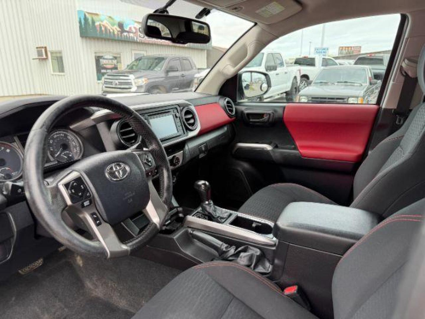 2016 Super White /Black/Red Toyota Tacoma (3TMDZ5BN8GM) with an 35L V-6 portdirect injection engine, Automatic transmission, located at 1175 N Woodruff Ave, Idaho Falls, ID, 83401, 43.506901, -111.999657 - At Timberline Auto, finding a great deal on your next vehicle is always easy! Our experienced sales staff's goal is to help find you the right vehicle at the right price! Our knowledgeable finance department has options for almost any credit score. We offer extended service contract options to prote - Photo#34