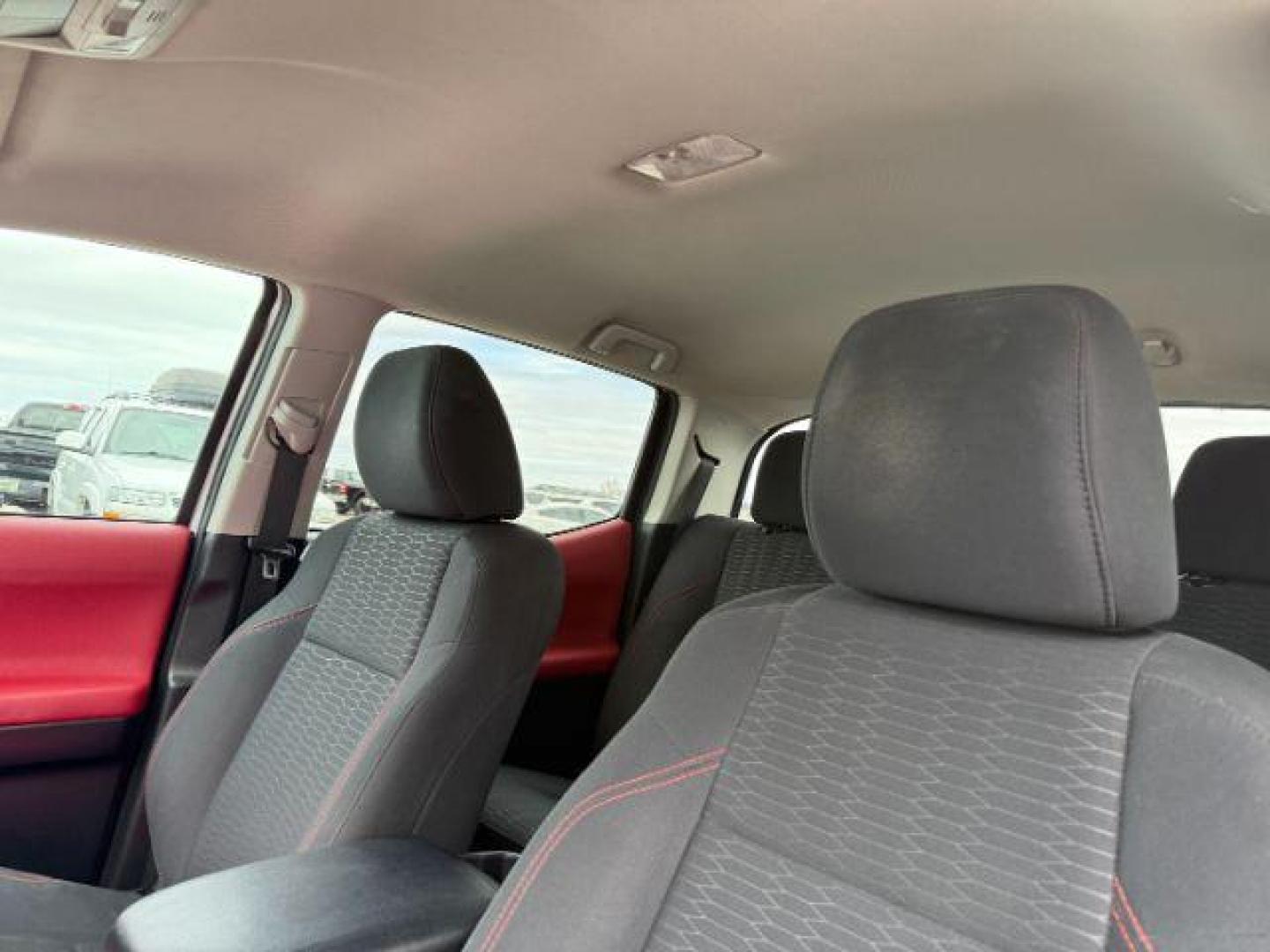 2016 Super White /Black/Red Toyota Tacoma (3TMDZ5BN8GM) with an 35L V-6 portdirect injection engine, Automatic transmission, located at 1175 N Woodruff Ave, Idaho Falls, ID, 83401, 43.506901, -111.999657 - At Timberline Auto, finding a great deal on your next vehicle is always easy! Our experienced sales staff's goal is to help find you the right vehicle at the right price! Our knowledgeable finance department has options for almost any credit score. We offer extended service contract options to prote - Photo#37