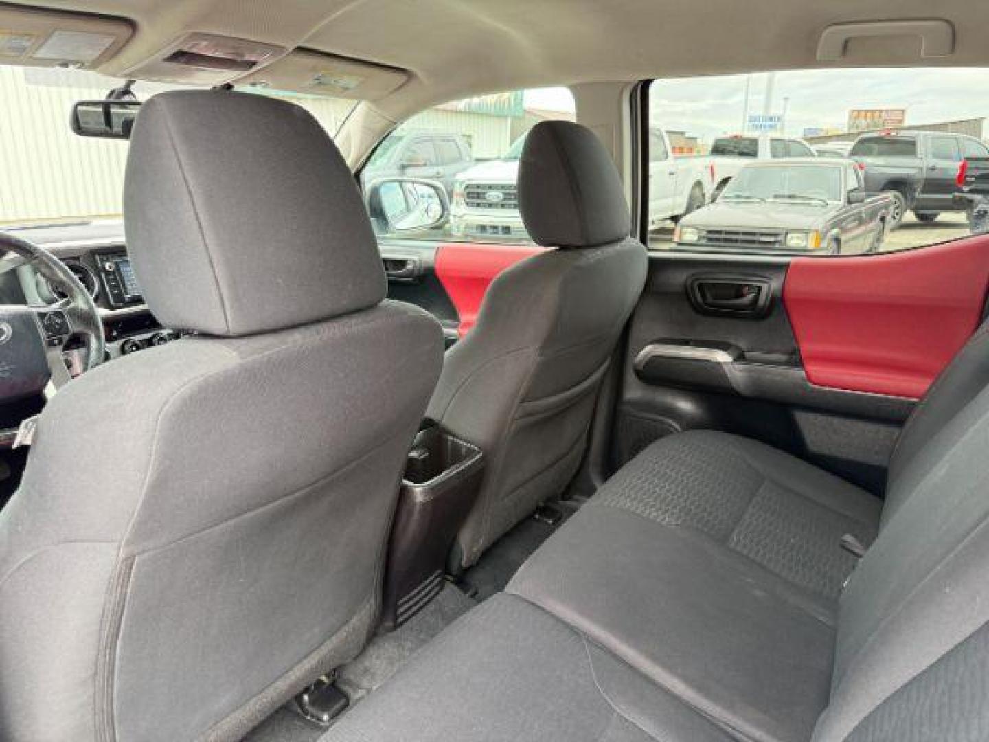 2016 Super White /Black/Red Toyota Tacoma (3TMDZ5BN8GM) with an 35L V-6 portdirect injection engine, Automatic transmission, located at 1175 N Woodruff Ave, Idaho Falls, ID, 83401, 43.506901, -111.999657 - At Timberline Auto, finding a great deal on your next vehicle is always easy! Our experienced sales staff's goal is to help find you the right vehicle at the right price! Our knowledgeable finance department has options for almost any credit score. We offer extended service contract options to prote - Photo#40