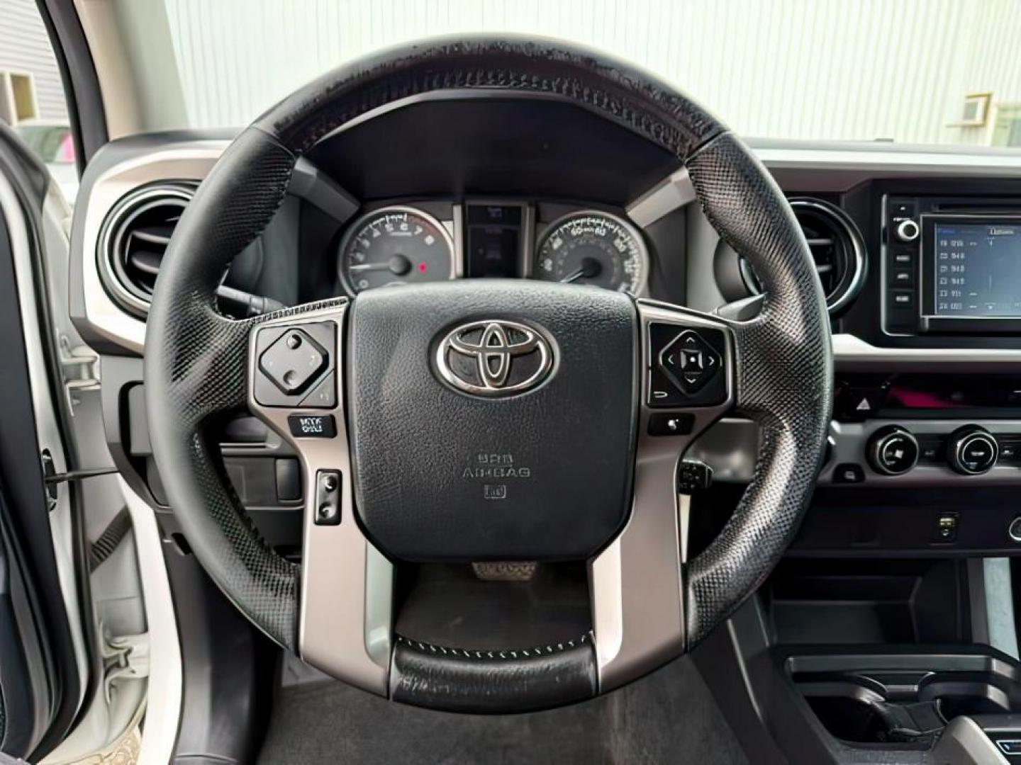 2016 Super White /Black/Red Toyota Tacoma (3TMDZ5BN8GM) with an 35L V-6 portdirect injection engine, Automatic transmission, located at 1175 N Woodruff Ave, Idaho Falls, ID, 83401, 43.506901, -111.999657 - At Timberline Auto, finding a great deal on your next vehicle is always easy! Our experienced sales staff's goal is to help find you the right vehicle at the right price! Our knowledgeable finance department has options for almost any credit score. We offer extended service contract options to prote - Photo#14