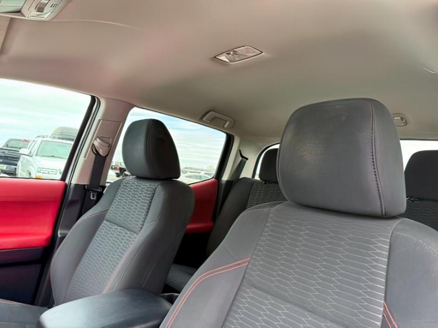 2016 Super White /Black/Red Toyota Tacoma (3TMDZ5BN8GM) with an 35L V-6 portdirect injection engine, Automatic transmission, located at 1175 N Woodruff Ave, Idaho Falls, ID, 83401, 43.506901, -111.999657 - At Timberline Auto, finding a great deal on your next vehicle is always easy! Our experienced sales staff's goal is to help find you the right vehicle at the right price! Our knowledgeable finance department has options for almost any credit score. We offer extended service contract options to prote - Photo#16