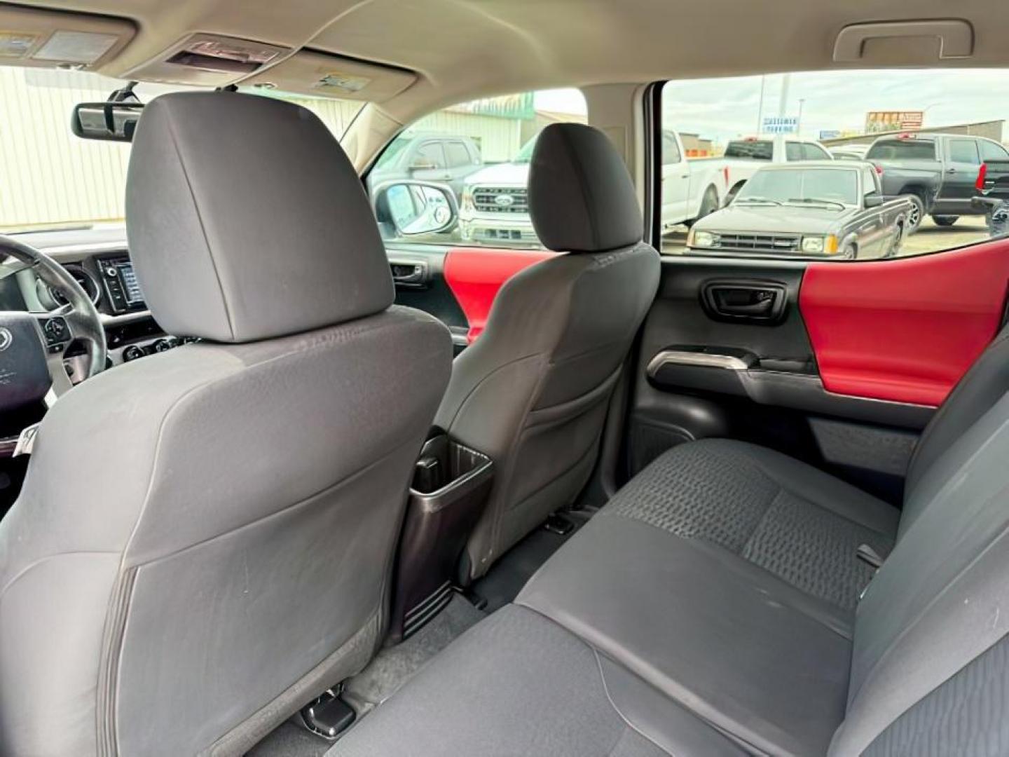 2016 Super White /Black/Red Toyota Tacoma (3TMDZ5BN8GM) with an 35L V-6 portdirect injection engine, Automatic transmission, located at 1175 N Woodruff Ave, Idaho Falls, ID, 83401, 43.506901, -111.999657 - At Timberline Auto, finding a great deal on your next vehicle is always easy! Our experienced sales staff's goal is to help find you the right vehicle at the right price! Our knowledgeable finance department has options for almost any credit score. We offer extended service contract options to prote - Photo#19