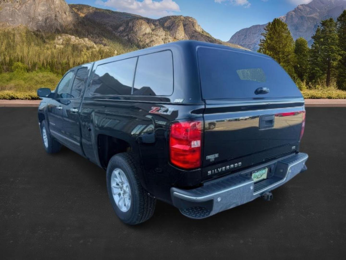 2014 BLACK /Jet Black Chevrolet Silverado 1500 (1GCVKSEC6EZ) with an EcoTec3 53L V-8 gasoline direct injection engine, Automatic transmission, located at 1175 N Woodruff Ave, Idaho Falls, ID, 83401, 43.506901, -111.999657 - At Timberline Auto, finding a great deal on your next vehicle is always easy! Our experienced sales staff's goal is to help find you the right vehicle at the right price! Our knowledgeable finance department has options for almost any credit score. We offer extended service contract options to prote - Photo#2