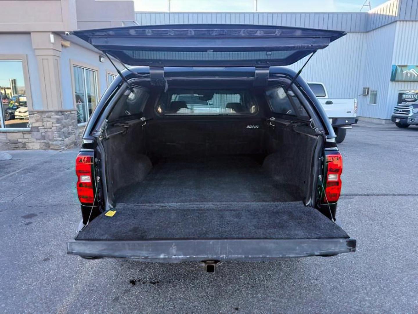 2014 BLACK /Jet Black Chevrolet Silverado 1500 (1GCVKSEC6EZ) with an EcoTec3 53L V-8 gasoline direct injection engine, Automatic transmission, located at 1175 N Woodruff Ave, Idaho Falls, ID, 83401, 43.506901, -111.999657 - At Timberline Auto, finding a great deal on your next vehicle is always easy! Our experienced sales staff's goal is to help find you the right vehicle at the right price! Our knowledgeable finance department has options for almost any credit score. We offer extended service contract options to prote - Photo#5
