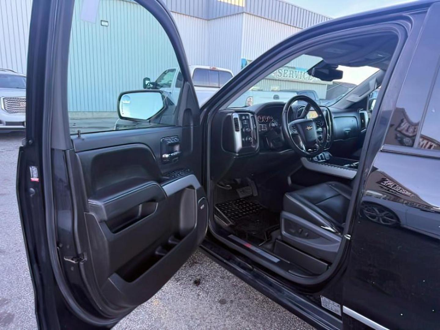 2014 BLACK /Jet Black Chevrolet Silverado 1500 (1GCVKSEC6EZ) with an EcoTec3 53L V-8 gasoline direct injection engine, Automatic transmission, located at 1175 N Woodruff Ave, Idaho Falls, ID, 83401, 43.506901, -111.999657 - At Timberline Auto, finding a great deal on your next vehicle is always easy! Our experienced sales staff's goal is to help find you the right vehicle at the right price! Our knowledgeable finance department has options for almost any credit score. We offer extended service contract options to prote - Photo#12