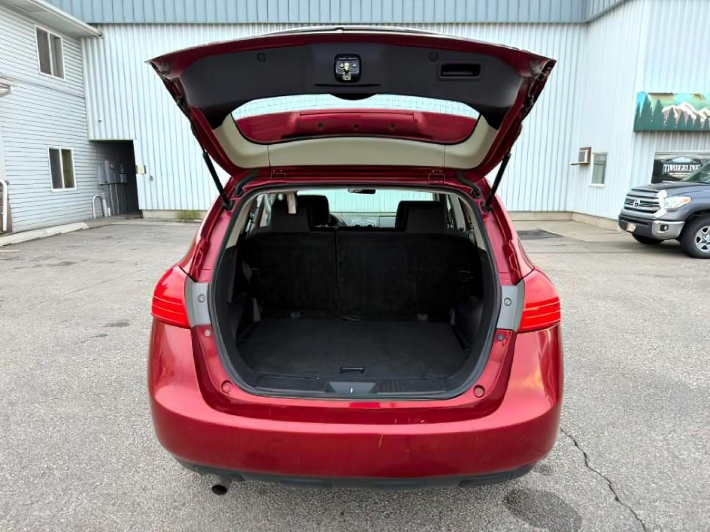 2015 RED /Black Nissan Rogue Select (JN8AS5MV4FW) with an 25L I-4 DOHC engine, Automatic transmission, located at 1175 N Woodruff Ave, Idaho Falls, ID, 83401, 43.506901, -111.999657 - At Timberline Auto, finding a great deal on your next vehicle is always easy! Our experienced sales staff's goal is to help find you the right vehicle at the right price! Our knowledgeable finance department has options for almost any credit score. We offer extended service contract options to prote - Photo#5