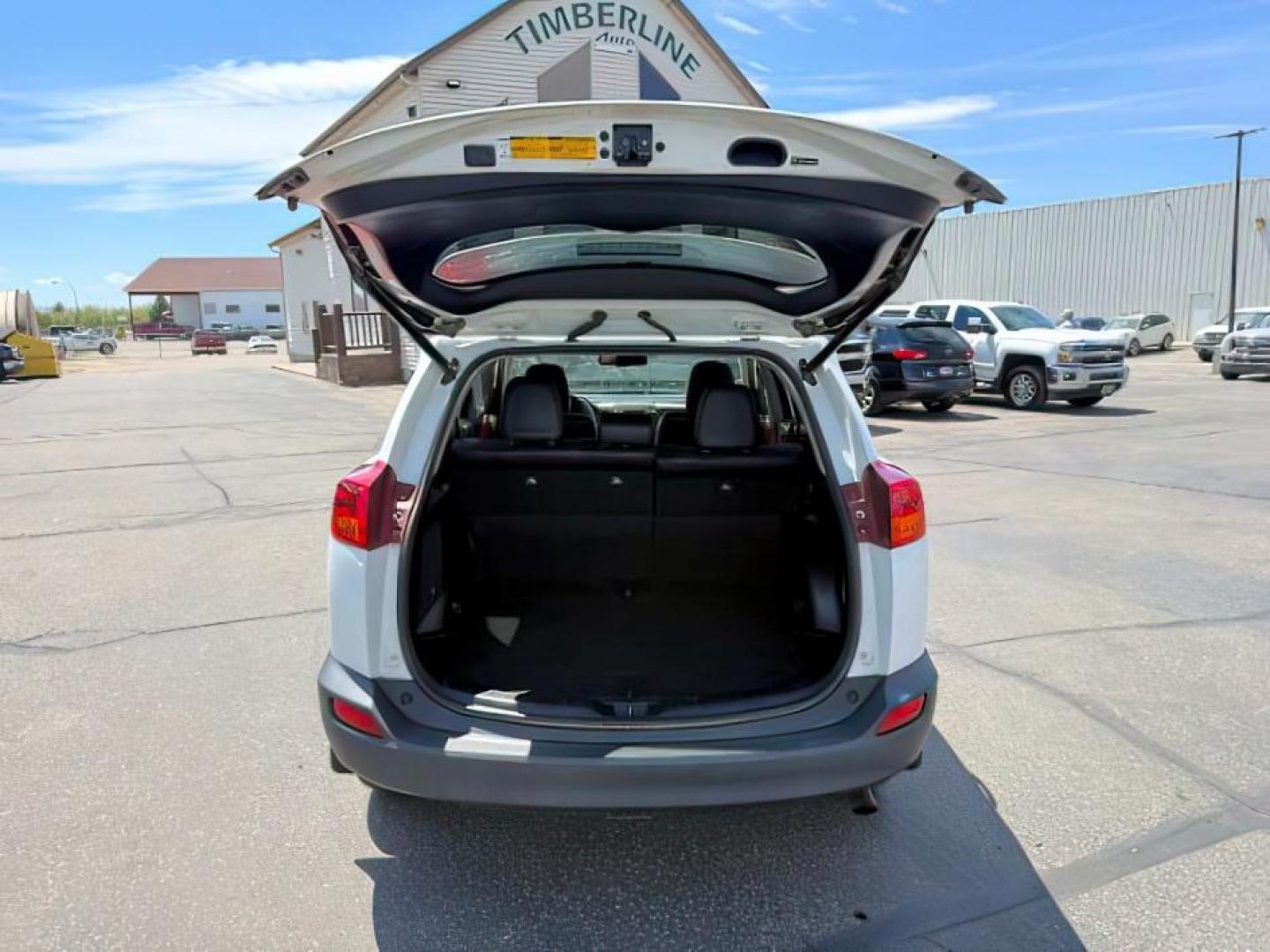2013 WHITE /Black Toyota RAV4 (2T3DFREV8DW) with an 25L L4 DOHC 16V engine, Automatic transmission, located at 1175 N Woodruff Ave, Idaho Falls, ID, 83401, 43.506901, -111.999657 - Photo#5