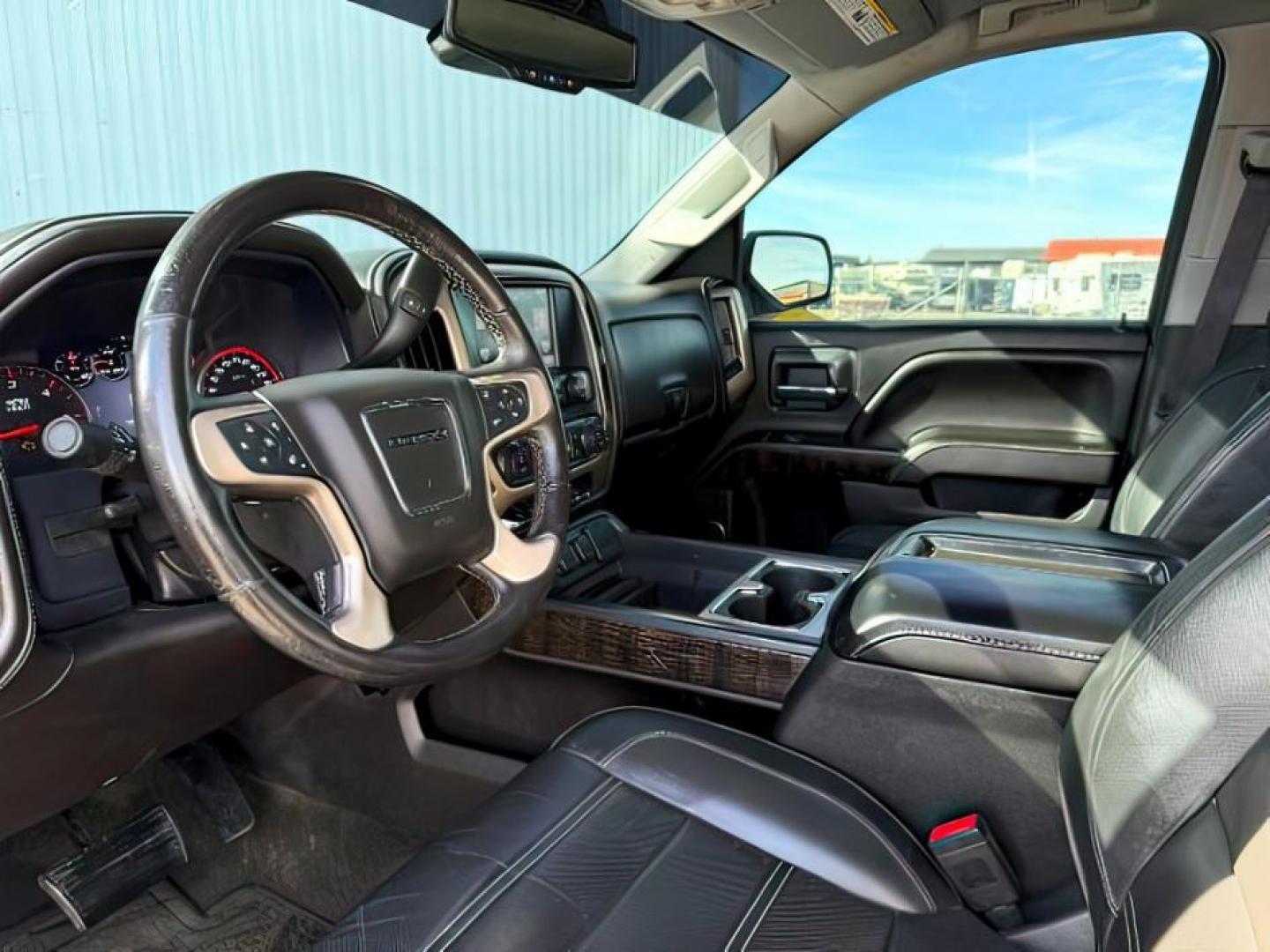 2015 Onyx Black /Jet Black GMC Sierra 1500 (3GTU2WEJ6FG) with an EcoTec3 62L V-8 gasoline direct injection engine, Automatic transmission, located at 1175 N Woodruff Ave, Idaho Falls, ID, 83401, 43.506901, -111.999657 - At Timberline Auto, finding a great deal on your next vehicle is always easy! Our experienced sales staff's goal is to help find you the right vehicle at the right price! Our knowledgeable finance department has options for almost any credit score. We offer extended service contract options to prote - Photo#12