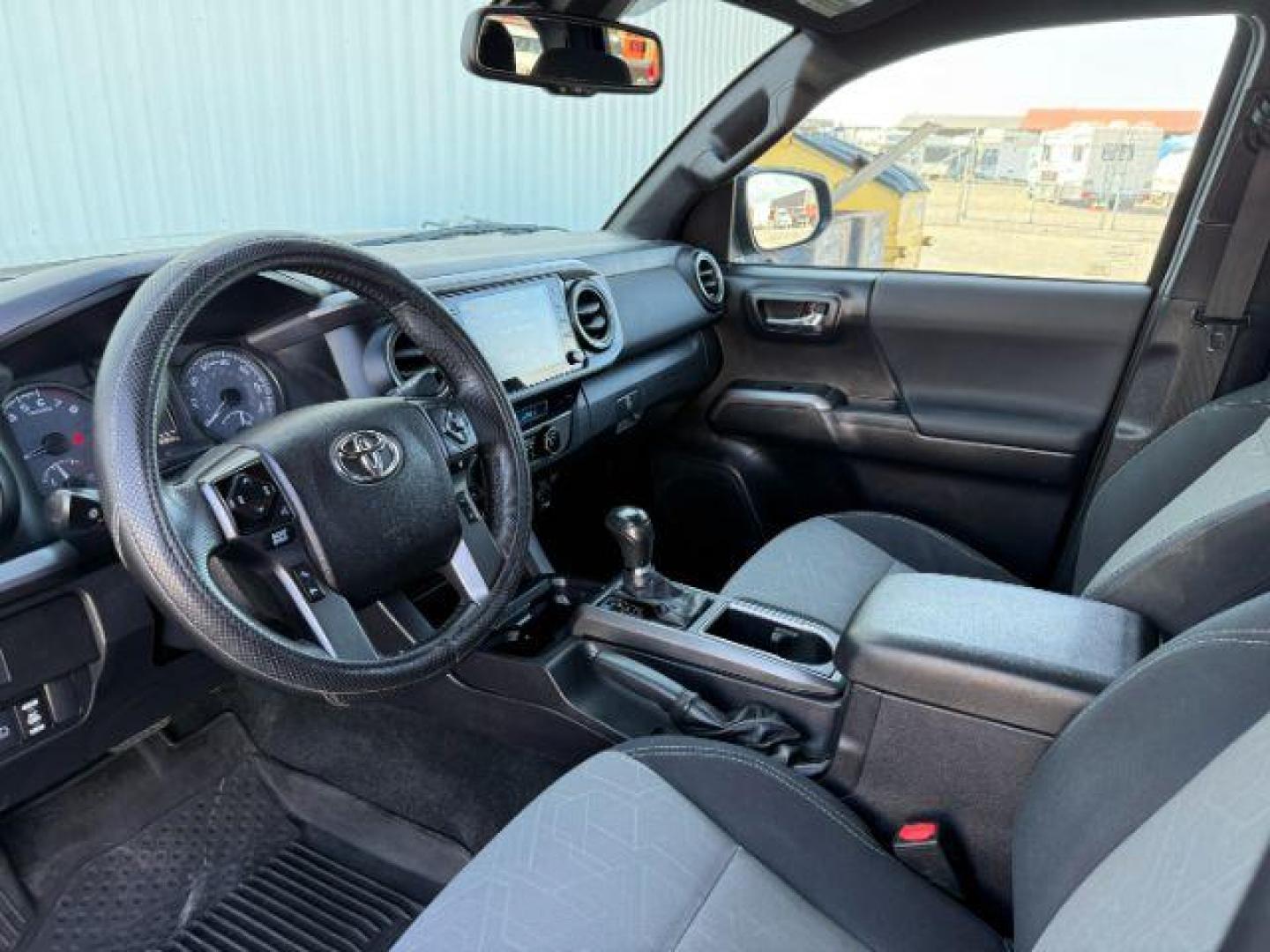 2021 Midnight Black Metallic /Black/Gun Metal Toyota Tacoma 4WD (3TMCZ5AN1MM) with an 35L V-6 portdirect injection engine, Automatic transmission, located at 1175 N Woodruff Ave, Idaho Falls, ID, 83401, 43.506901, -111.999657 - At Timberline Auto, finding a great deal on your next vehicle is always easy! Our experienced sales staff's goal is to help find you the right vehicle at the right price! Our knowledgeable finance department has options for almost any credit score. We offer extended service contract options to prote - Photo#39