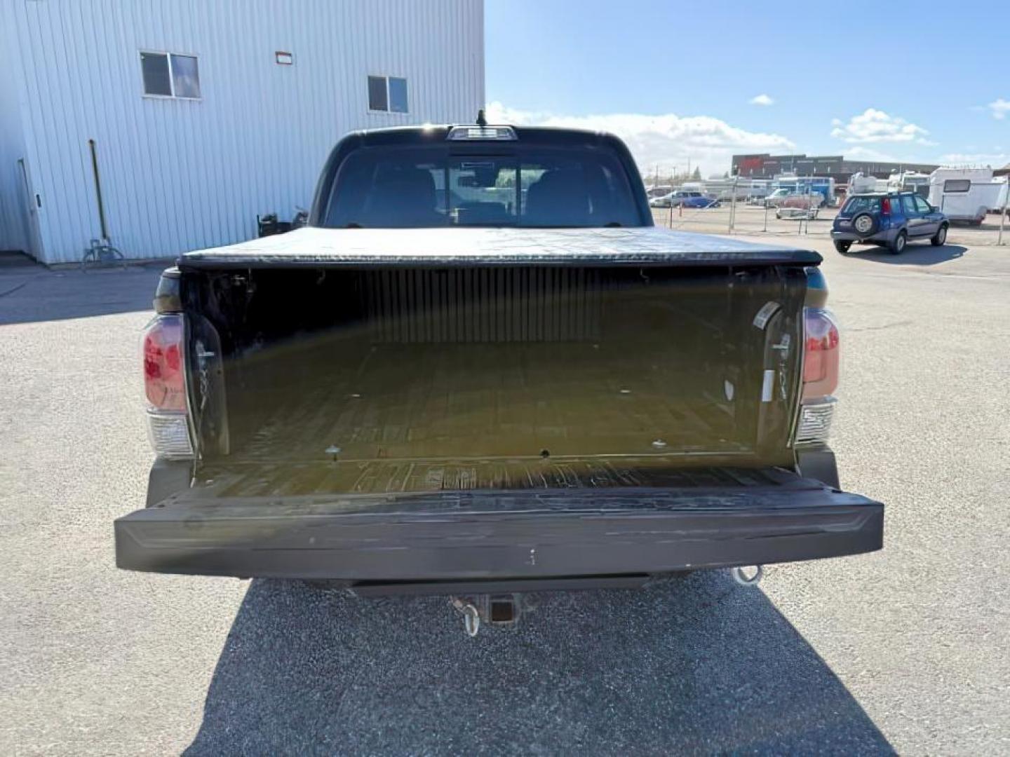 2021 Midnight Black Metallic /Black/Gun Metal Toyota Tacoma 4WD (3TMCZ5AN1MM) with an 35L V-6 portdirect injection engine, Automatic transmission, located at 1175 N Woodruff Ave, Idaho Falls, ID, 83401, 43.506901, -111.999657 - At Timberline Auto, finding a great deal on your next vehicle is always easy! Our experienced sales staff's goal is to help find you the right vehicle at the right price! Our knowledgeable finance department has options for almost any credit score. We offer extended service contract options to prote - Photo#5
