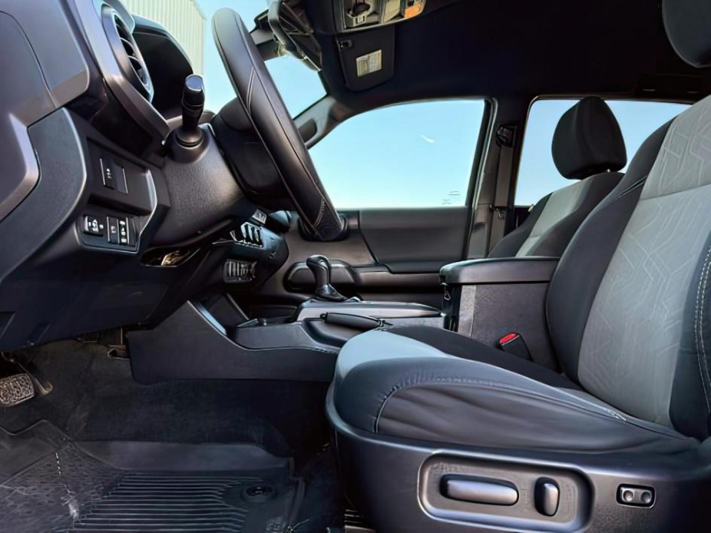 2021 Midnight Black Metallic /Black/Gun Metal Toyota Tacoma 4WD (3TMCZ5AN1MM) with an 35L V-6 portdirect injection engine, Automatic transmission, located at 1175 N Woodruff Ave, Idaho Falls, ID, 83401, 43.506901, -111.999657 - At Timberline Auto, finding a great deal on your next vehicle is always easy! Our experienced sales staff's goal is to help find you the right vehicle at the right price! Our knowledgeable finance department has options for almost any credit score. We offer extended service contract options to prote - Photo#13