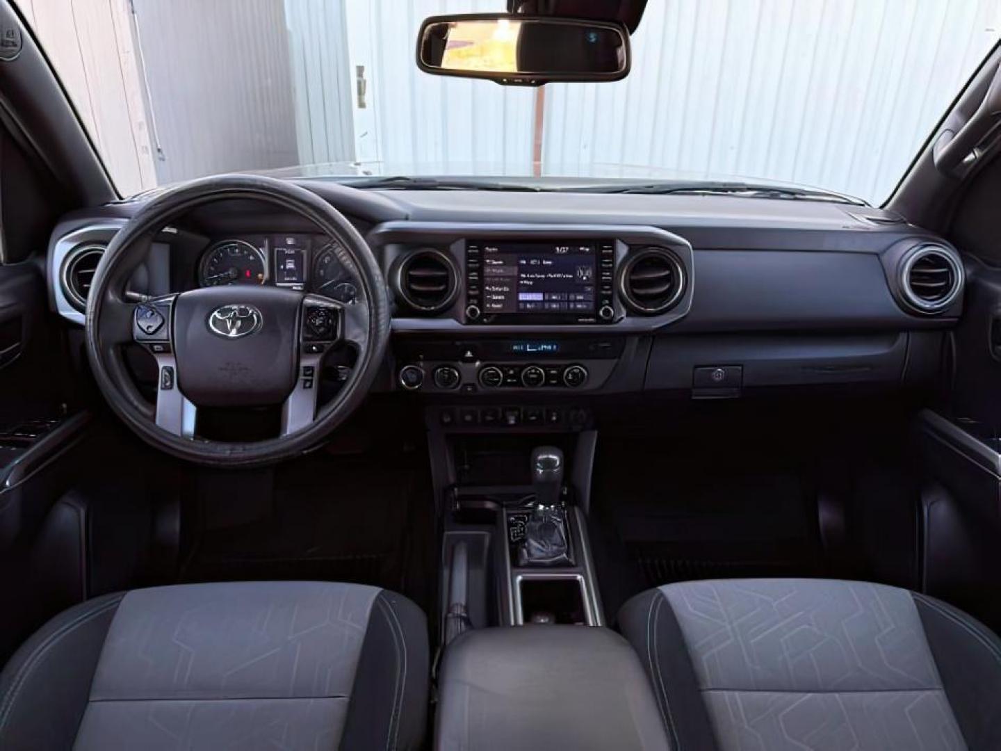 2021 Midnight Black Metallic /Black/Gun Metal Toyota Tacoma 4WD (3TMCZ5AN1MM) with an 35L V-6 portdirect injection engine, Automatic transmission, located at 1175 N Woodruff Ave, Idaho Falls, ID, 83401, 43.506901, -111.999657 - At Timberline Auto, finding a great deal on your next vehicle is always easy! Our experienced sales staff's goal is to help find you the right vehicle at the right price! Our knowledgeable finance department has options for almost any credit score. We offer extended service contract options to prote - Photo#22