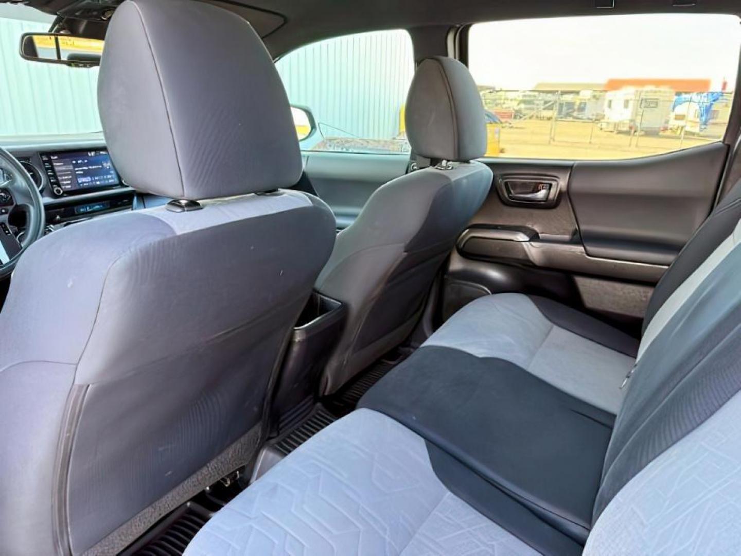 2021 Midnight Black Metallic /Black/Gun Metal Toyota Tacoma 4WD (3TMCZ5AN1MM) with an 35L V-6 portdirect injection engine, Automatic transmission, located at 1175 N Woodruff Ave, Idaho Falls, ID, 83401, 43.506901, -111.999657 - At Timberline Auto, finding a great deal on your next vehicle is always easy! Our experienced sales staff's goal is to help find you the right vehicle at the right price! Our knowledgeable finance department has options for almost any credit score. We offer extended service contract options to prote - Photo#23