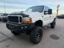 1999 WHITE /Medium Graphite Ford F-350 (1FTSX31F0XE) with an 73L V-8 diesel direct injection engine, Manual transmission, located at 1175 N Woodruff Ave, Idaho Falls, ID, 83401, 43.506901, -111.999657 - At Timberline Auto, finding a great deal on your next vehicle is always easy! Our experienced sales staff's goal is to help find you the right vehicle at the right price! Our knowledgeable finance department has options for almost any credit score. We offer extended service contract options to prote - Photo#13