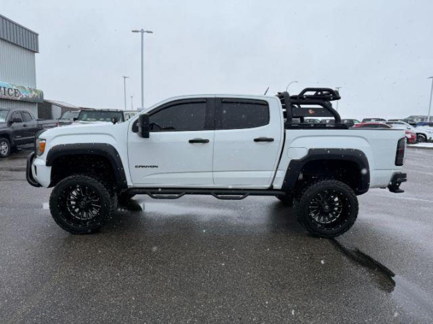2019 WHITE /Jet Black GMC Canyon (1GTG5CEN4K1) with an 36L V-6 gasoline direct injection engine, Automatic transmission, located at 1175 N Woodruff Ave, Idaho Falls, ID, 83401, 43.506901, -111.999657 - At Timberline Auto, finding a great deal on your next vehicle is always easy! Our experienced sales staff's goal is to help find you the right vehicle at the right price! Our knowledgeable finance department has options for almost any credit score. We offer extended service contract options to prote - Photo#26