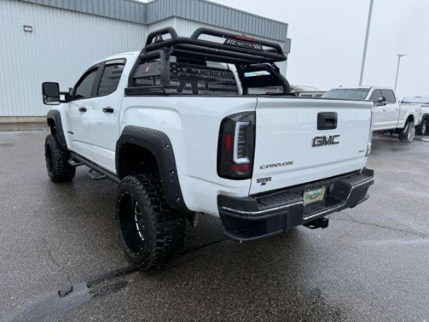 2019 WHITE /Jet Black GMC Canyon (1GTG5CEN4K1) with an 36L V-6 gasoline direct injection engine, Automatic transmission, located at 1175 N Woodruff Ave, Idaho Falls, ID, 83401, 43.506901, -111.999657 - At Timberline Auto, finding a great deal on your next vehicle is always easy! Our experienced sales staff's goal is to help find you the right vehicle at the right price! Our knowledgeable finance department has options for almost any credit score. We offer extended service contract options to prote - Photo#27