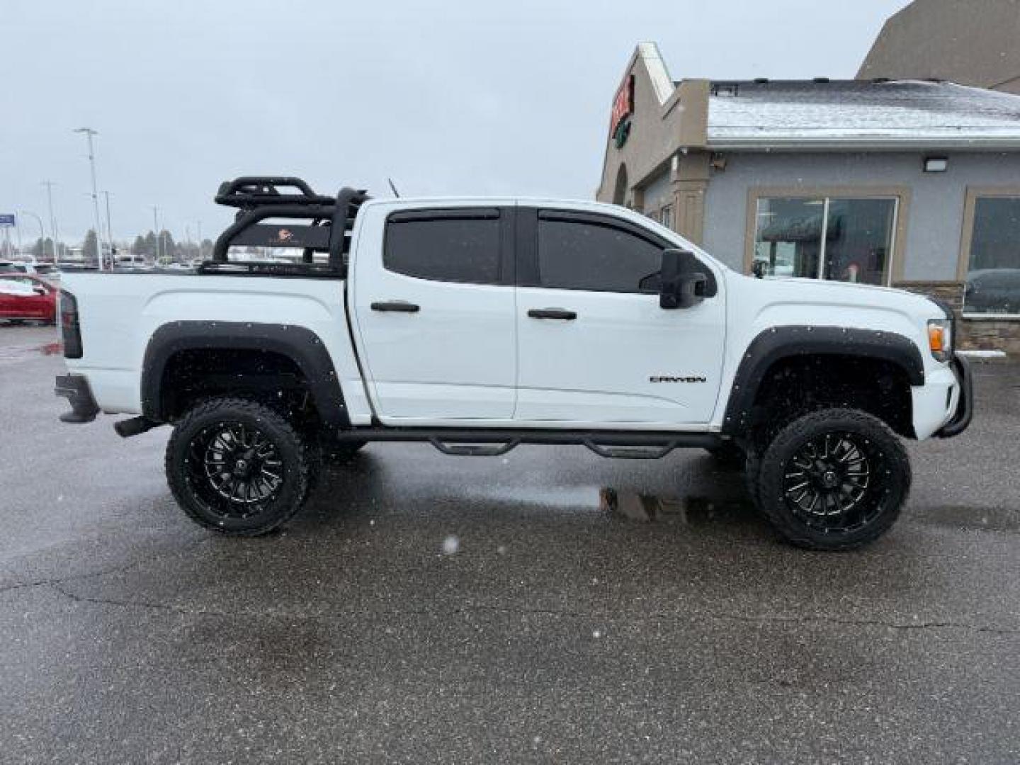 2019 WHITE /Jet Black GMC Canyon (1GTG5CEN4K1) with an 36L V-6 gasoline direct injection engine, Automatic transmission, located at 1175 N Woodruff Ave, Idaho Falls, ID, 83401, 43.506901, -111.999657 - At Timberline Auto, finding a great deal on your next vehicle is always easy! Our experienced sales staff's goal is to help find you the right vehicle at the right price! Our knowledgeable finance department has options for almost any credit score. We offer extended service contract options to prote - Photo#32