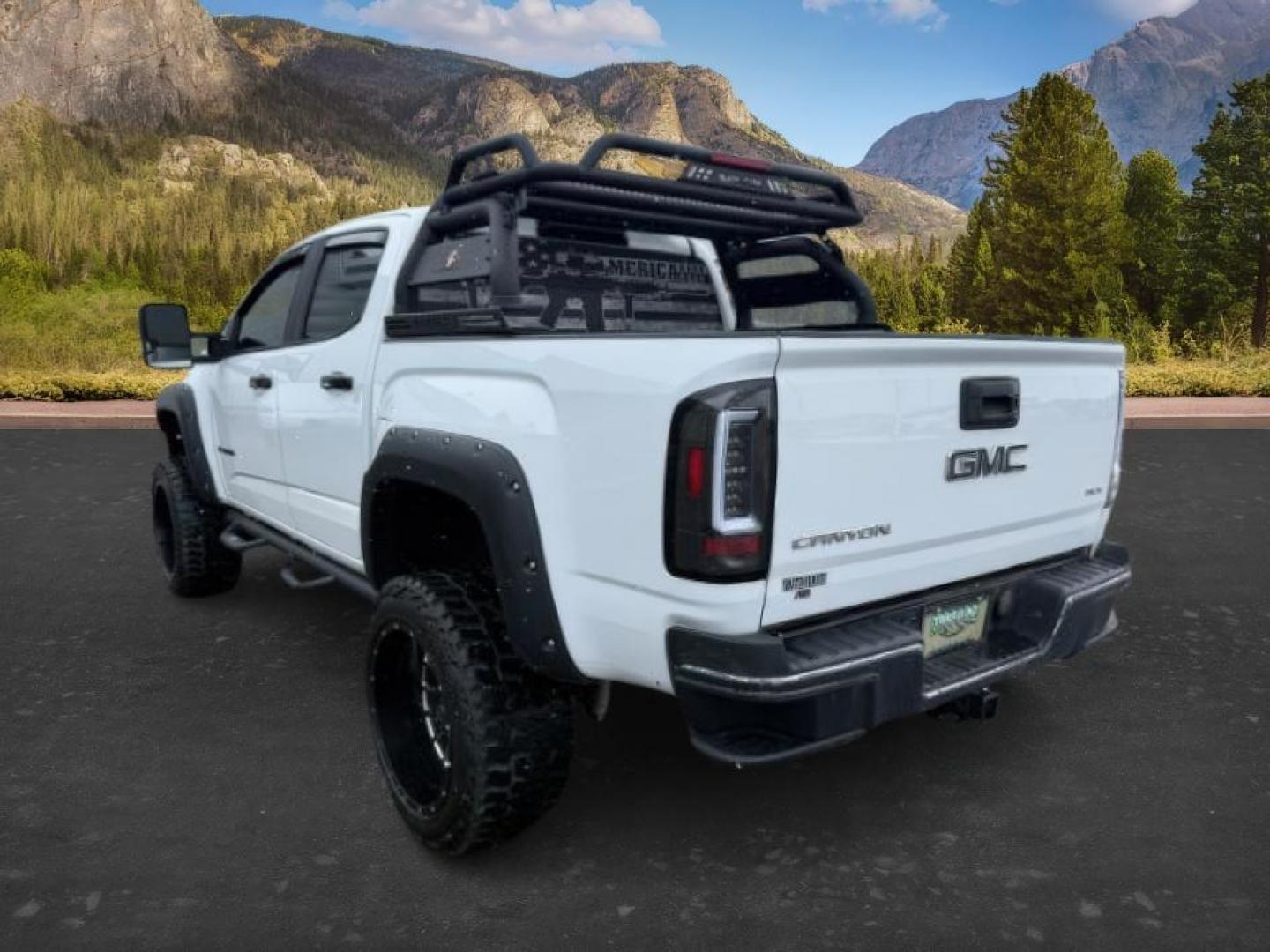 2019 WHITE /Jet Black GMC Canyon (1GTG5CEN4K1) with an 36L V-6 gasoline direct injection engine, Automatic transmission, located at 1175 N Woodruff Ave, Idaho Falls, ID, 83401, 43.506901, -111.999657 - At Timberline Auto, finding a great deal on your next vehicle is always easy! Our experienced sales staff's goal is to help find you the right vehicle at the right price! Our knowledgeable finance department has options for almost any credit score. We offer extended service contract options to prote - Photo#2