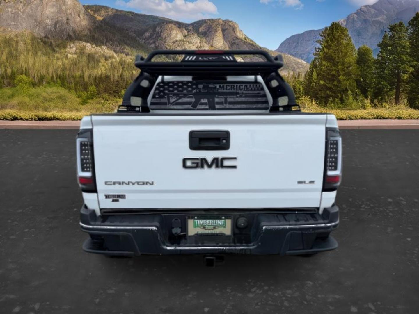 2019 WHITE /Jet Black GMC Canyon (1GTG5CEN4K1) with an 36L V-6 gasoline direct injection engine, Automatic transmission, located at 1175 N Woodruff Ave, Idaho Falls, ID, 83401, 43.506901, -111.999657 - At Timberline Auto, finding a great deal on your next vehicle is always easy! Our experienced sales staff's goal is to help find you the right vehicle at the right price! Our knowledgeable finance department has options for almost any credit score. We offer extended service contract options to prote - Photo#3