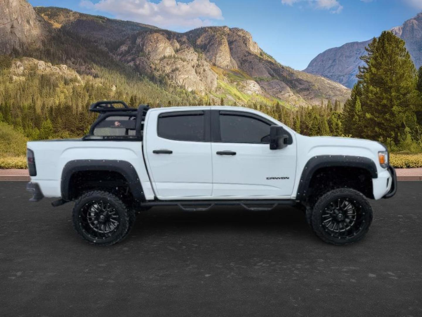 2019 WHITE /Jet Black GMC Canyon (1GTG5CEN4K1) with an 36L V-6 gasoline direct injection engine, Automatic transmission, located at 1175 N Woodruff Ave, Idaho Falls, ID, 83401, 43.506901, -111.999657 - At Timberline Auto, finding a great deal on your next vehicle is always easy! Our experienced sales staff's goal is to help find you the right vehicle at the right price! Our knowledgeable finance department has options for almost any credit score. We offer extended service contract options to prote - Photo#7
