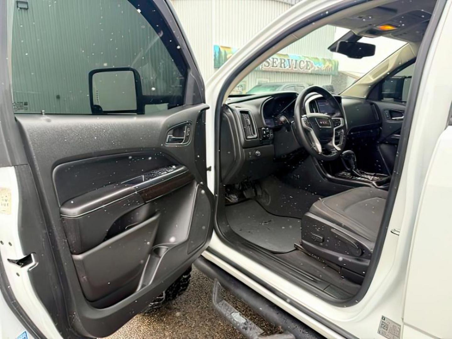 2019 WHITE /Jet Black GMC Canyon (1GTG5CEN4K1) with an 36L V-6 gasoline direct injection engine, Automatic transmission, located at 1175 N Woodruff Ave, Idaho Falls, ID, 83401, 43.506901, -111.999657 - At Timberline Auto, finding a great deal on your next vehicle is always easy! Our experienced sales staff's goal is to help find you the right vehicle at the right price! Our knowledgeable finance department has options for almost any credit score. We offer extended service contract options to prote - Photo#12