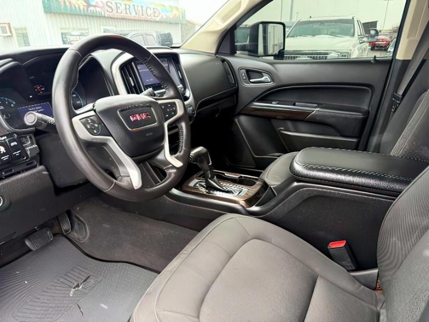 2019 WHITE /Jet Black GMC Canyon (1GTG5CEN4K1) with an 36L V-6 gasoline direct injection engine, Automatic transmission, located at 1175 N Woodruff Ave, Idaho Falls, ID, 83401, 43.506901, -111.999657 - At Timberline Auto, finding a great deal on your next vehicle is always easy! Our experienced sales staff's goal is to help find you the right vehicle at the right price! Our knowledgeable finance department has options for almost any credit score. We offer extended service contract options to prote - Photo#14