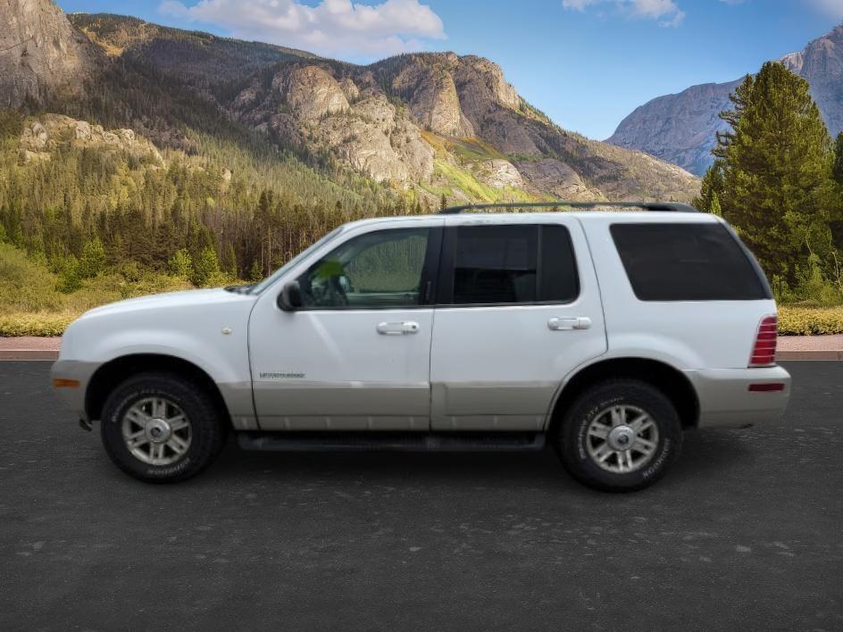 2002 WHITE /CLOTH Mercury Mountaineer BASE (4M2ZU86E52Z) with an 4.0L V6 engine, AUTOMATIC transmission, located at 1235 N Woodruff Ave., Idaho Falls, 83401, (208) 523-1053, 43.507172, -112.000488 - 2002 Mercury Mountaineer AWD combines traditional SUV capability with upscale comfort. Powered by a 4.0L V6 and automatic transmission, it offers all-wheel drive confidence, leather seating, automatic climate control, power front seats, and a premium audio system. Spacious seating and flexible cargo- Photo#1