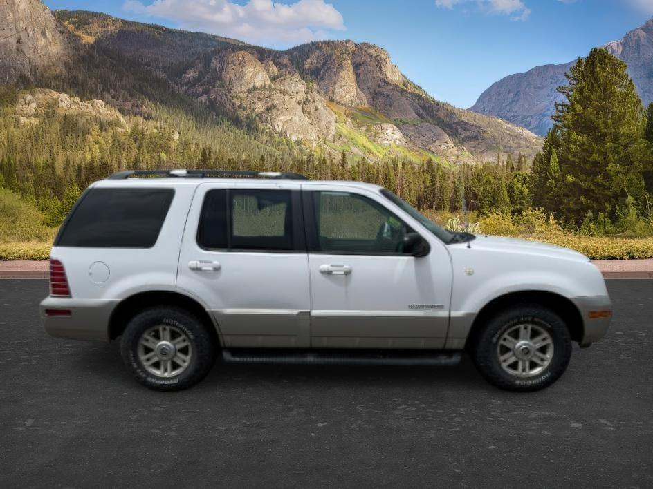 2002 WHITE /CLOTH Mercury Mountaineer BASE (4M2ZU86E52Z) with an 4.0L V6 engine, AUTOMATIC transmission, located at 1235 N Woodruff Ave., Idaho Falls, 83401, (208) 523-1053, 43.507172, -112.000488 - 2002 Mercury Mountaineer AWD combines traditional SUV capability with upscale comfort. Powered by a 4.0L V6 and automatic transmission, it offers all-wheel drive confidence, leather seating, automatic climate control, power front seats, and a premium audio system. Spacious seating and flexible cargo- Photo#5