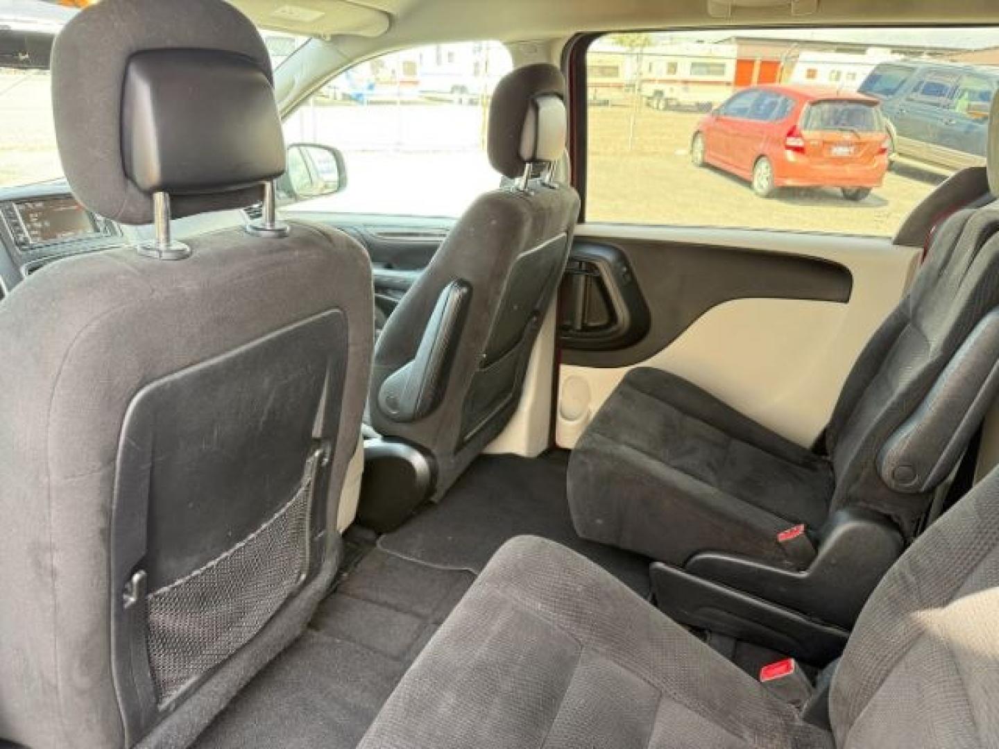 2015 MAROON /Black Dodge Grand Caravan (2C4RDGCG0FR) with an 36L V-6 DOHC engine, Automatic transmission, located at 1175 N Woodruff Ave, Idaho Falls, ID, 83401, 43.506901, -111.999657 - At Timberline Auto, finding a great deal on your next vehicle is always easy! Our experienced sales staff's goal is to help find you the right vehicle at the right price! Our knowledgeable finance department has options for almost any credit score. We offer extended service contract options to prote - Photo#51