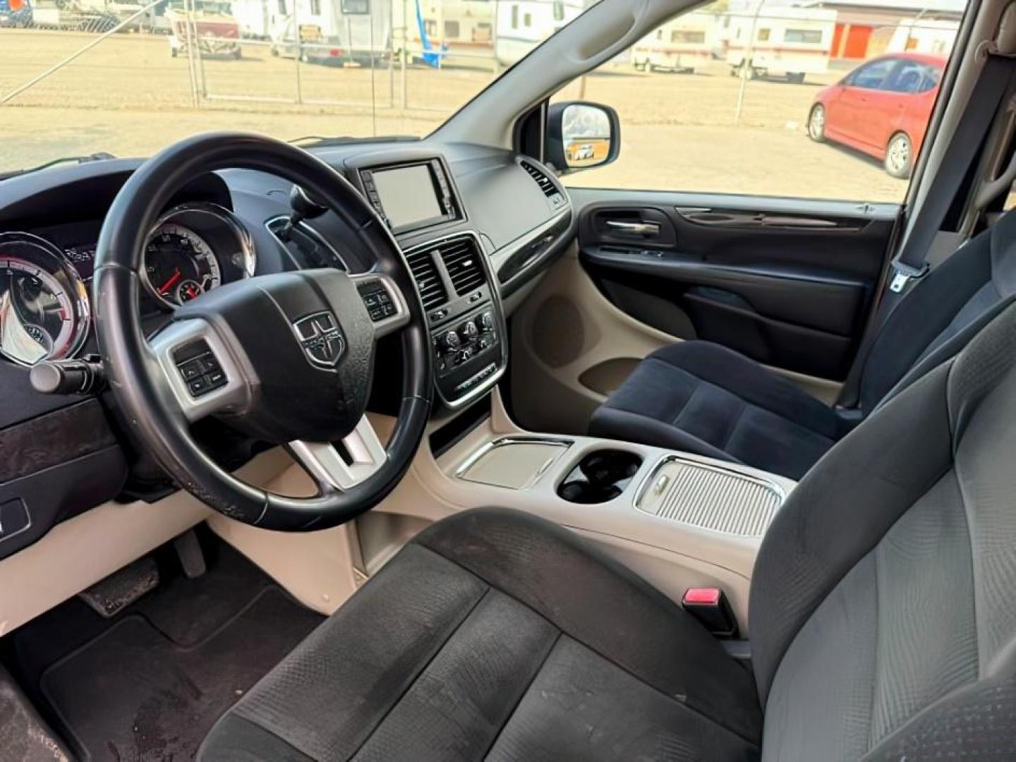2015 MAROON /Black Dodge Grand Caravan (2C4RDGCG0FR) with an 36L V-6 DOHC engine, Automatic transmission, located at 1175 N Woodruff Ave, Idaho Falls, ID, 83401, 43.506901, -111.999657 - At Timberline Auto, finding a great deal on your next vehicle is always easy! Our experienced sales staff's goal is to help find you the right vehicle at the right price! Our knowledgeable finance department has options for almost any credit score. We offer extended service contract options to prote - Photo#15
