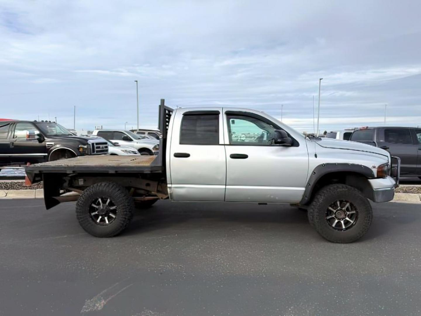 2003 SILVER /Dark Slate Gray Dodge Ram 2500 (3D7KU28C73G) with an Cummins 59L I-6 diesel direct injection engine, Automatic transmission, located at 1175 N Woodruff Ave, Idaho Falls, ID, 83401, 43.506901, -111.999657 - At Timberline Auto, finding a great deal on your next vehicle is always easy! Our experienced sales staff's goal is to help find you the right vehicle at the right price! Our knowledgeable finance department has options for almost any credit score. We offer extended service contract options to prote - Photo#0