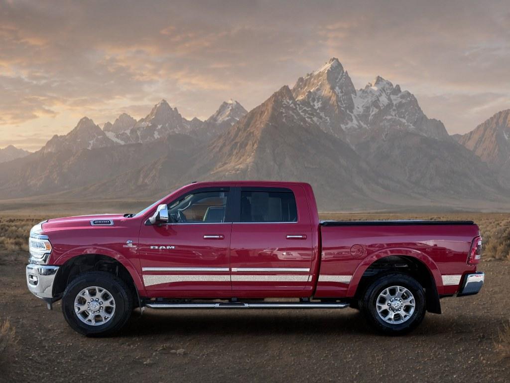 2021 Flame Red Clearcoat /Black Ram 2500 Laramie (3C6UR5FL2MG) with an 6 Cyl, 6.7L engine, 6-speed automatic transmission, located at 1175 N Woodruff Ave, Idaho Falls, ID, 83401, 43.506901, -111.999657 - <b>Vehicle Details</b><br>This 2021 Ram 2500 Laramie is a powerhouse built for drivers who demand serious capability, premium comfort, and bold style. Equipped with 4WD and a durable 6 Cylinder 6.7L Diesel engine, this heavy-duty truck is ready to tackle towing, hauling, and challenging road conditi- Photo#1