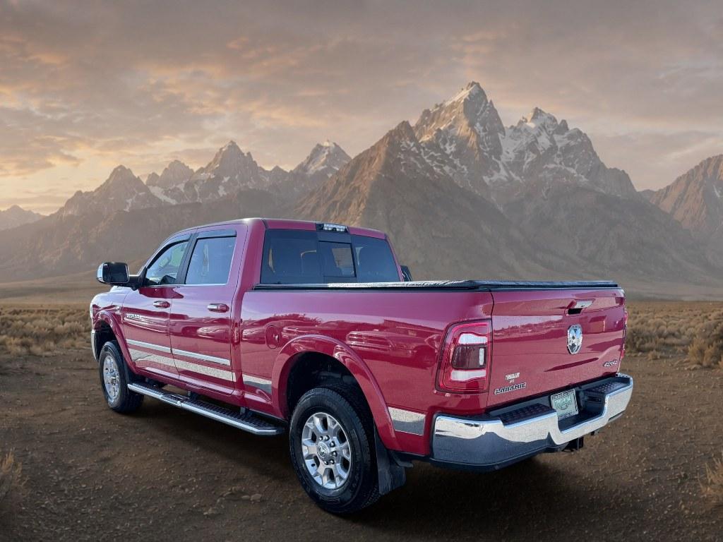 2021 Flame Red Clearcoat /Black Ram 2500 Laramie (3C6UR5FL2MG) with an 6 Cyl, 6.7L engine, 6-speed automatic transmission, located at 1175 N Woodruff Ave, Idaho Falls, ID, 83401, 43.506901, -111.999657 - <b>Vehicle Details</b><br>This 2021 Ram 2500 Laramie is a powerhouse built for drivers who demand serious capability, premium comfort, and bold style. Equipped with 4WD and a durable 6 Cylinder 6.7L Diesel engine, this heavy-duty truck is ready to tackle towing, hauling, and challenging road conditi- Photo#2