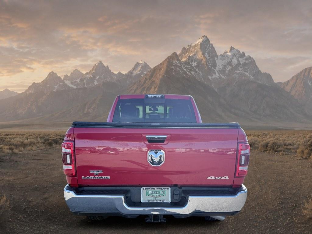 2021 Flame Red Clearcoat /Black Ram 2500 Laramie (3C6UR5FL2MG) with an 6 Cyl, 6.7L engine, 6-speed automatic transmission, located at 1175 N Woodruff Ave, Idaho Falls, ID, 83401, 43.506901, -111.999657 - <b>Vehicle Details</b><br>This 2021 Ram 2500 Laramie is a powerhouse built for drivers who demand serious capability, premium comfort, and bold style. Equipped with 4WD and a durable 6 Cylinder 6.7L Diesel engine, this heavy-duty truck is ready to tackle towing, hauling, and challenging road conditi- Photo#3