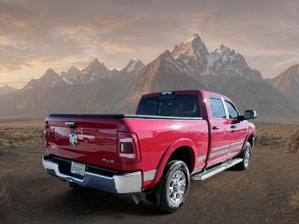 2021 Flame Red Clearcoat /Black Ram 2500 Laramie (3C6UR5FL2MG) with an 6 Cyl, 6.7L engine, 6-speed automatic transmission, located at 1175 N Woodruff Ave, Idaho Falls, ID, 83401, 43.506901, -111.999657 - <b>Vehicle Details</b><br>This 2021 Ram 2500 Laramie is a powerhouse built for drivers who demand serious capability, premium comfort, and bold style. Equipped with 4WD and a durable 6 Cylinder 6.7L Diesel engine, this heavy-duty truck is ready to tackle towing, hauling, and challenging road conditi- Photo#4