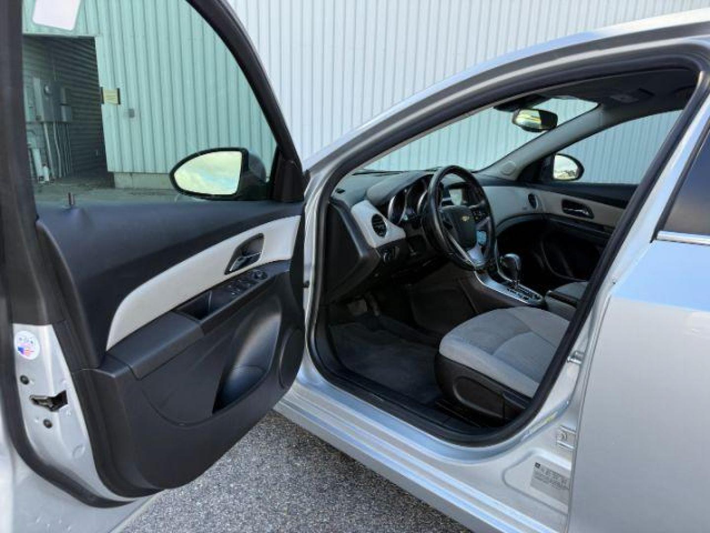 2014 SILVER /Jet Black Chevrolet Cruze (1G1PC5SB4E7) with an ECOTEC 14L I-4 DOHC engine, Automatic transmission, located at 1175 N Woodruff Ave, Idaho Falls, ID, 83401, 43.506901, -111.999657 - Photo#30
