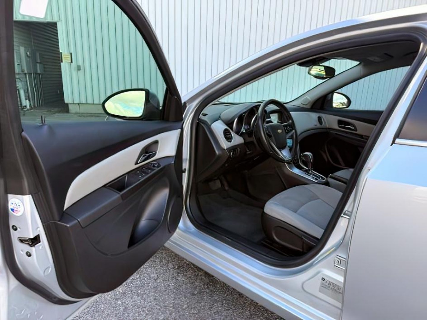 2014 SILVER /Jet Black Chevrolet Cruze (1G1PC5SB4E7) with an ECOTEC 14L I-4 DOHC engine, Automatic transmission, located at 1175 N Woodruff Ave, Idaho Falls, ID, 83401, 43.506901, -111.999657 - Photo#9