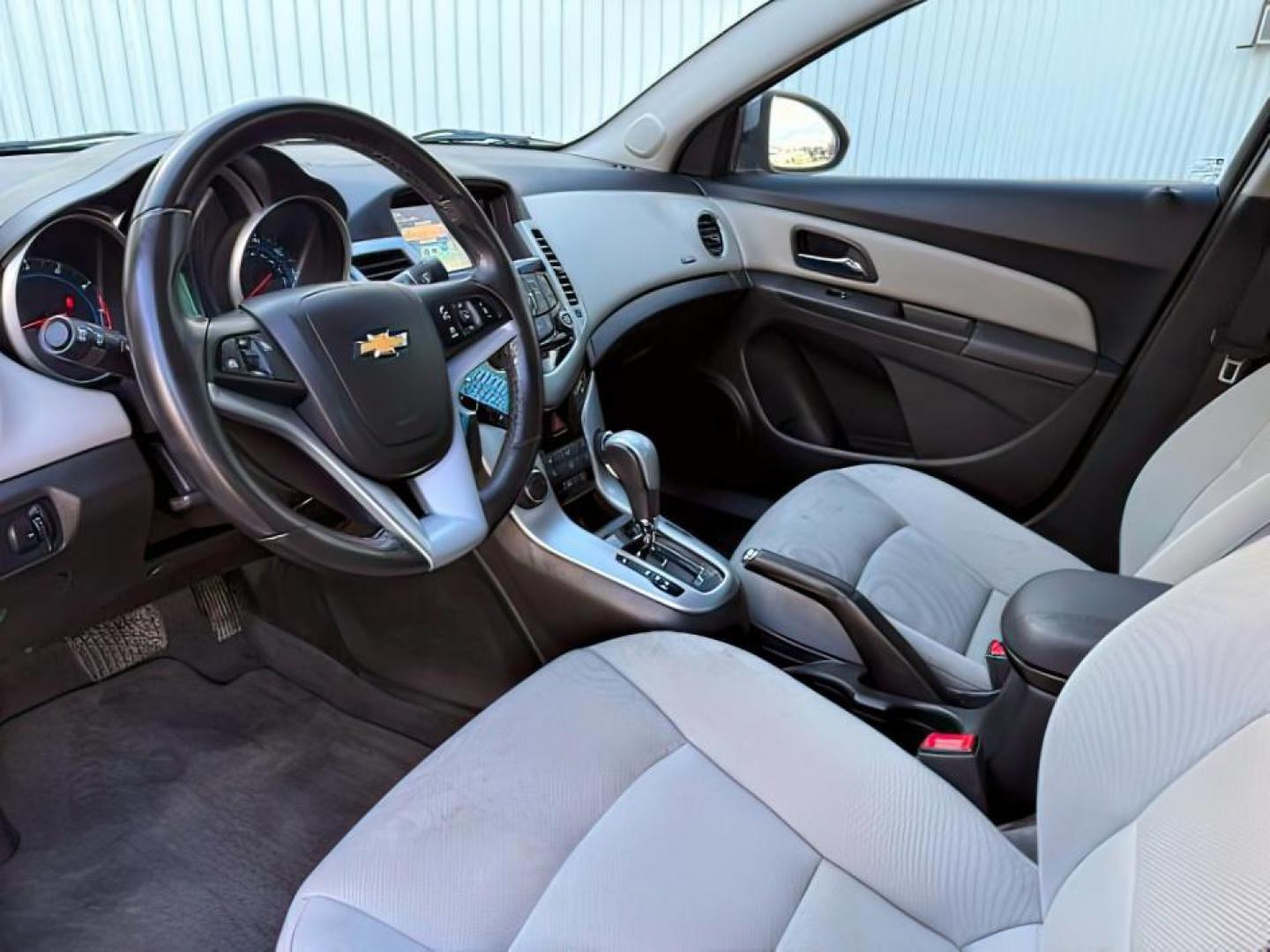 2014 SILVER /Jet Black Chevrolet Cruze (1G1PC5SB4E7) with an ECOTEC 14L I-4 DOHC engine, Automatic transmission, located at 1175 N Woodruff Ave, Idaho Falls, ID, 83401, 43.506901, -111.999657 - Photo#11