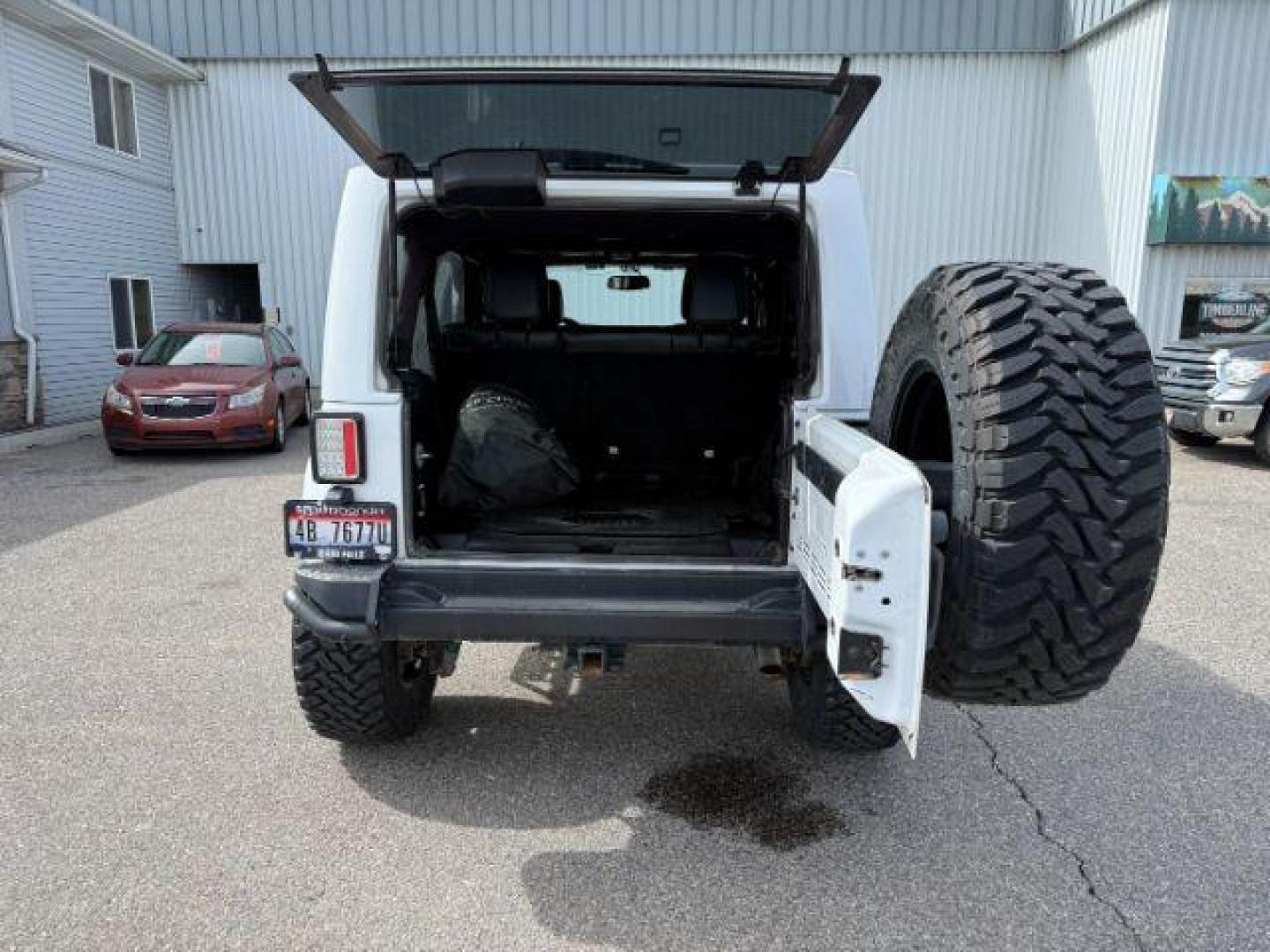 2016 WHITE /Black Jeep Wrangler Unlimited (1C4BJWEG5GL) with an Pentastar 36L V-6 DOHC engine, Automatic transmission, located at 1175 N Woodruff Ave, Idaho Falls, ID, 83401, 43.506901, -111.999657 - At Timberline Auto, finding a great deal on your next vehicle is always easy! Our experienced sales staff's goal is to help find you the right vehicle at the right price! Our knowledgeable finance department has options for almost any credit score. We offer extended service contract options to prote - Photo#26