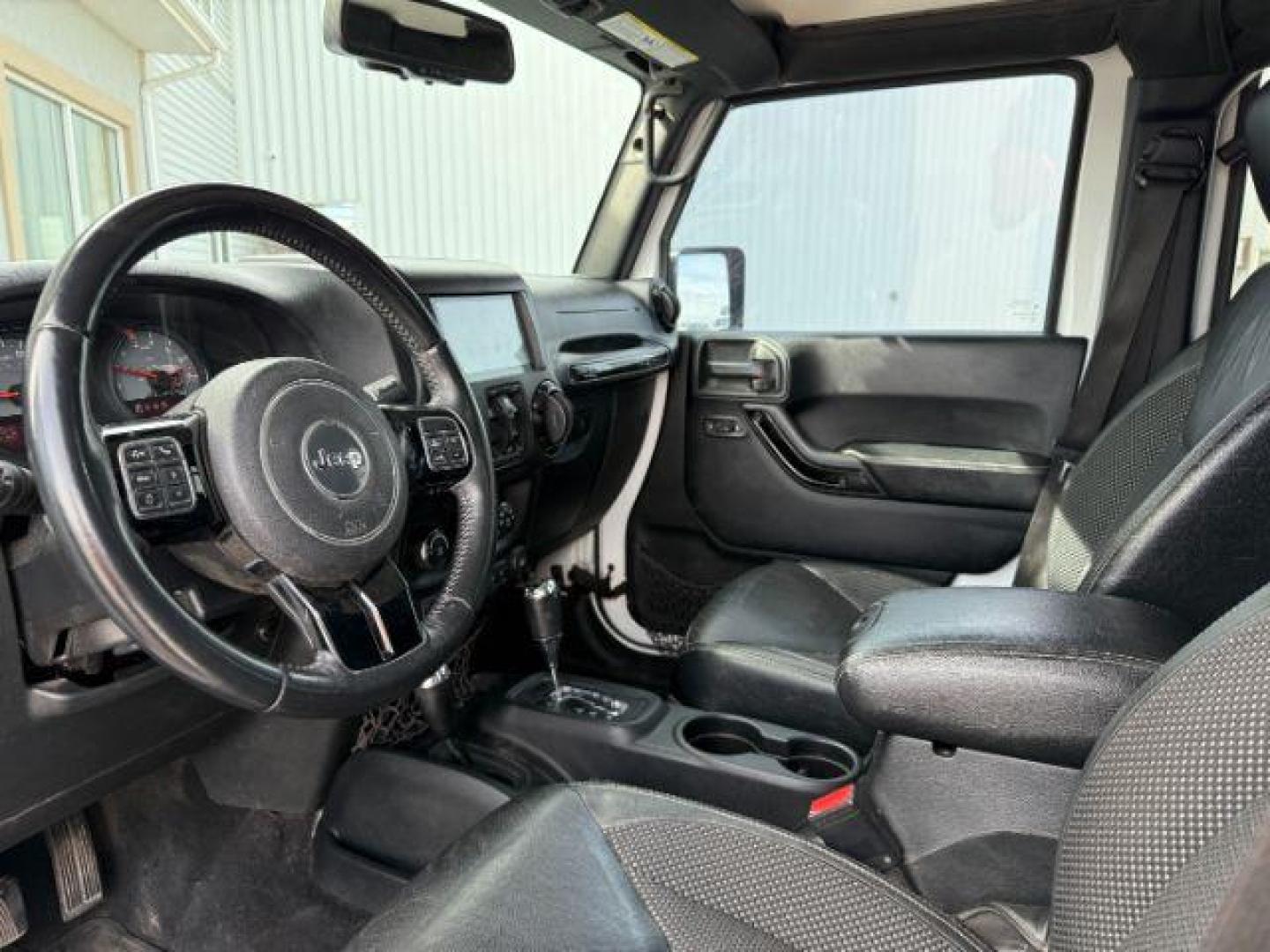 2016 WHITE /Black Jeep Wrangler Unlimited (1C4BJWEG5GL) with an Pentastar 36L V-6 DOHC engine, Automatic transmission, located at 1175 N Woodruff Ave, Idaho Falls, ID, 83401, 43.506901, -111.999657 - At Timberline Auto, finding a great deal on your next vehicle is always easy! Our experienced sales staff's goal is to help find you the right vehicle at the right price! Our knowledgeable finance department has options for almost any credit score. We offer extended service contract options to prote - Photo#36