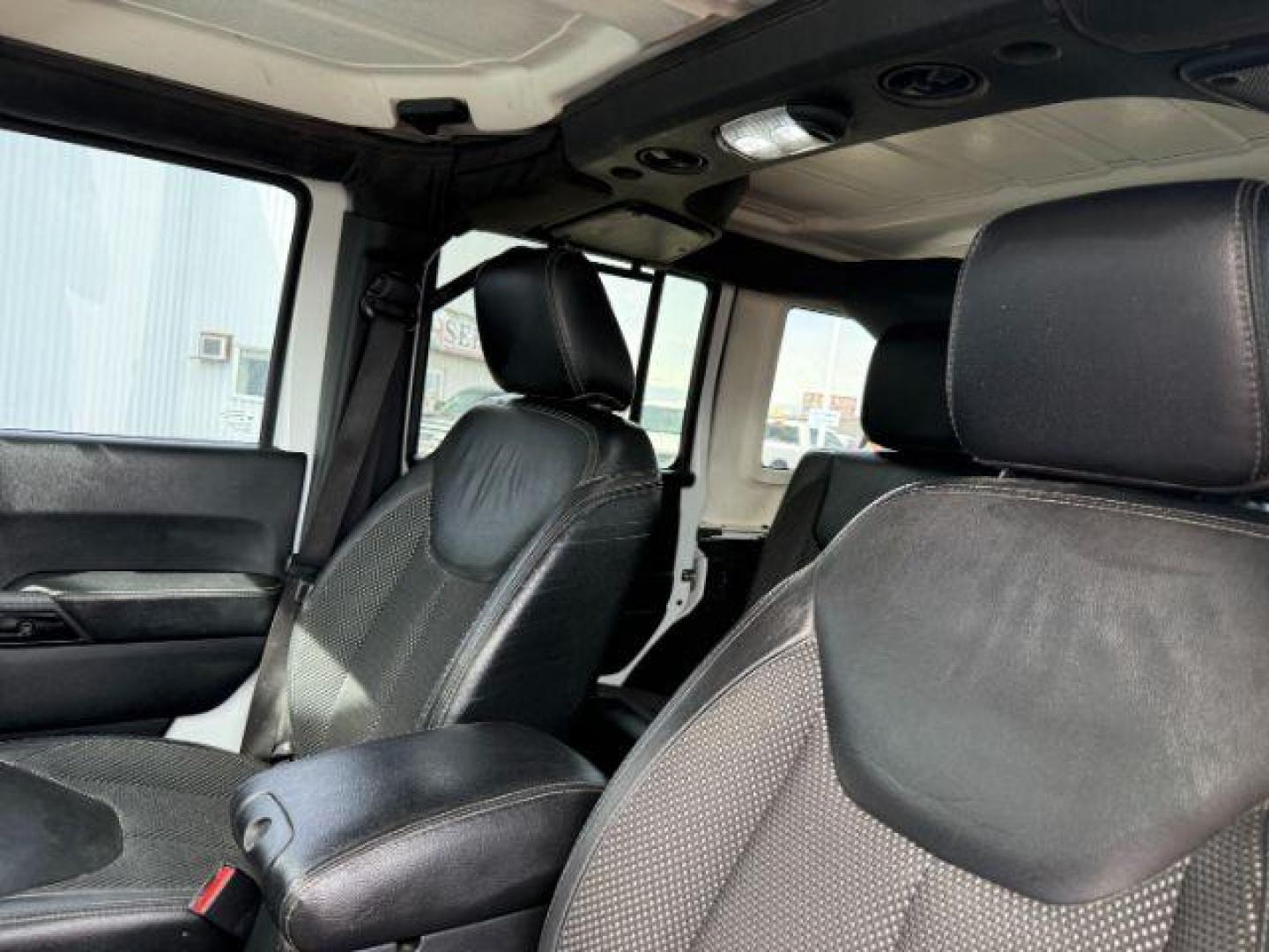 2016 WHITE /Black Jeep Wrangler Unlimited (1C4BJWEG5GL) with an Pentastar 36L V-6 DOHC engine, Automatic transmission, located at 1175 N Woodruff Ave, Idaho Falls, ID, 83401, 43.506901, -111.999657 - At Timberline Auto, finding a great deal on your next vehicle is always easy! Our experienced sales staff's goal is to help find you the right vehicle at the right price! Our knowledgeable finance department has options for almost any credit score. We offer extended service contract options to prote - Photo#40